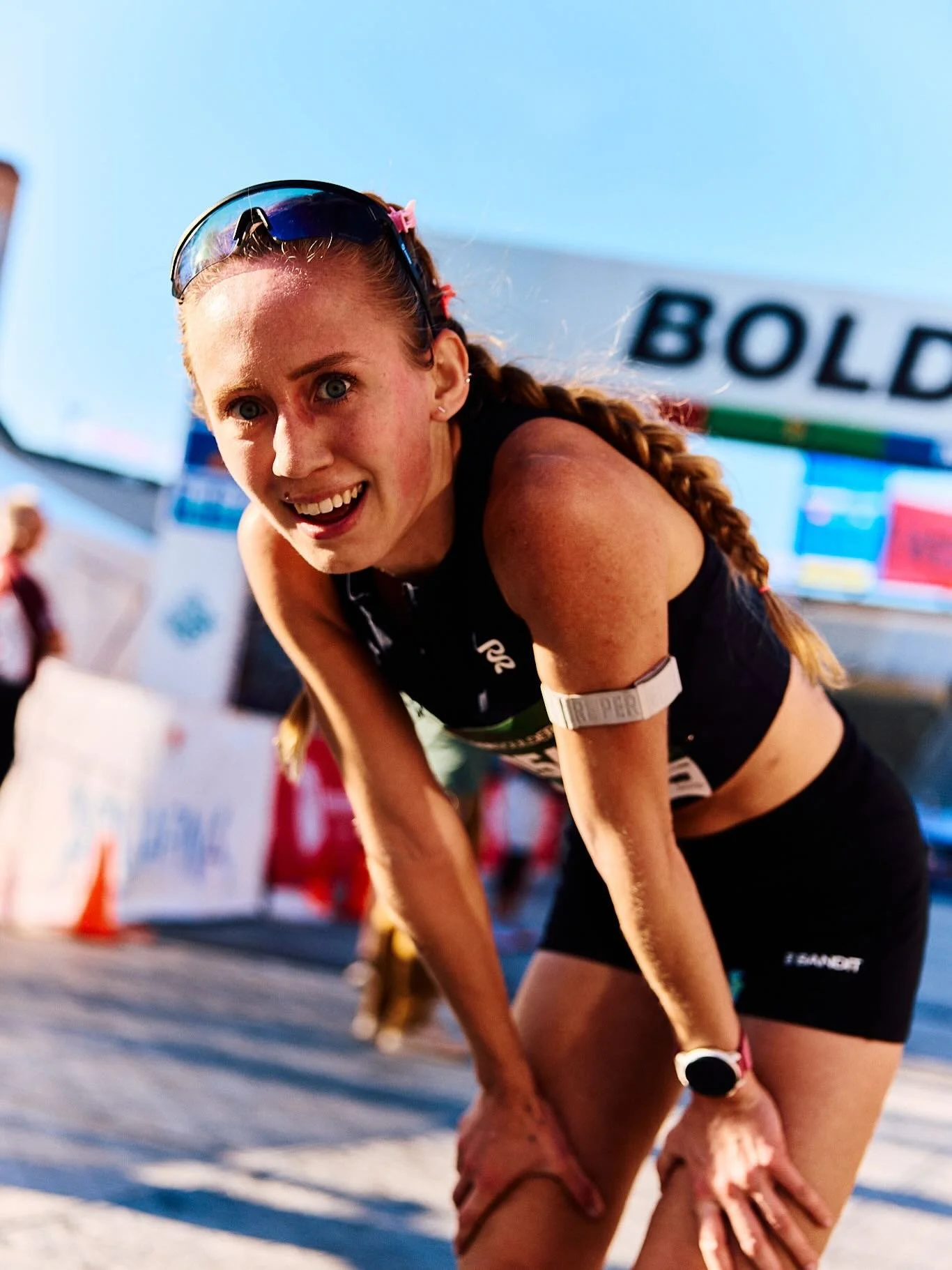 The anatomy of breaking the tape at the Bolder Boulder. 

Great run for Savannah Shaw.
@trainingpeaks 

PC1: @mralanlam 
PC2: @bolderboulder