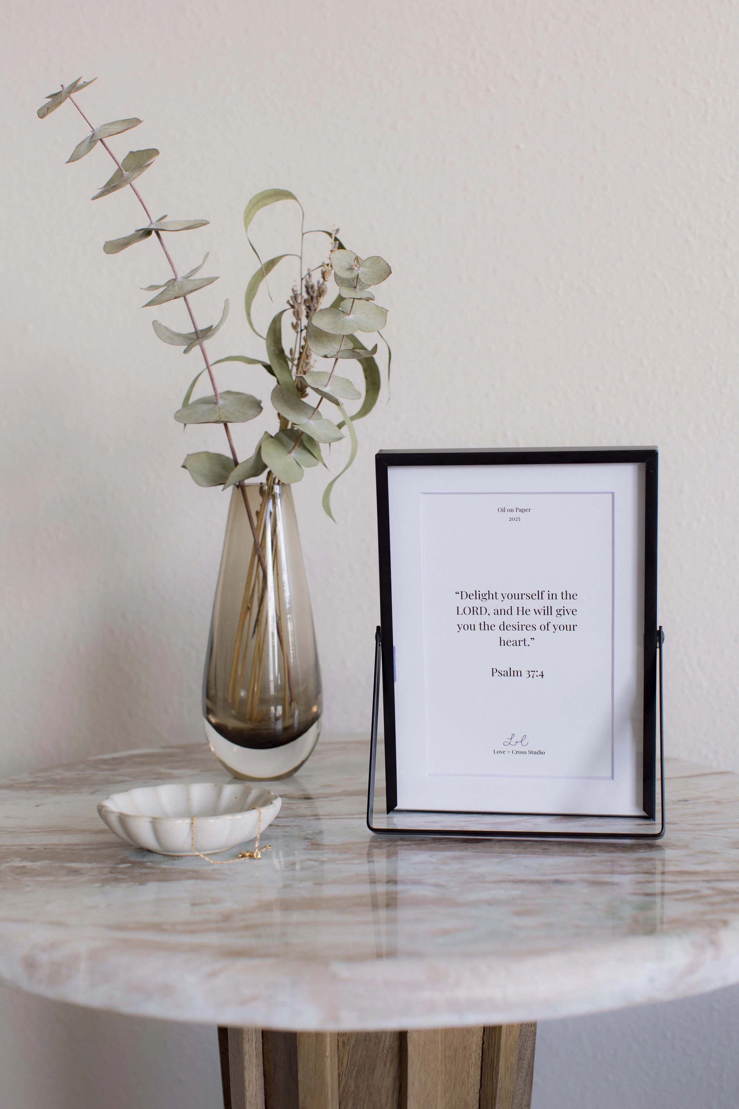 praiseful-messages-marigold-oils-originals-love-x-cross-studio-black-frame-lifestyle-back.jpg