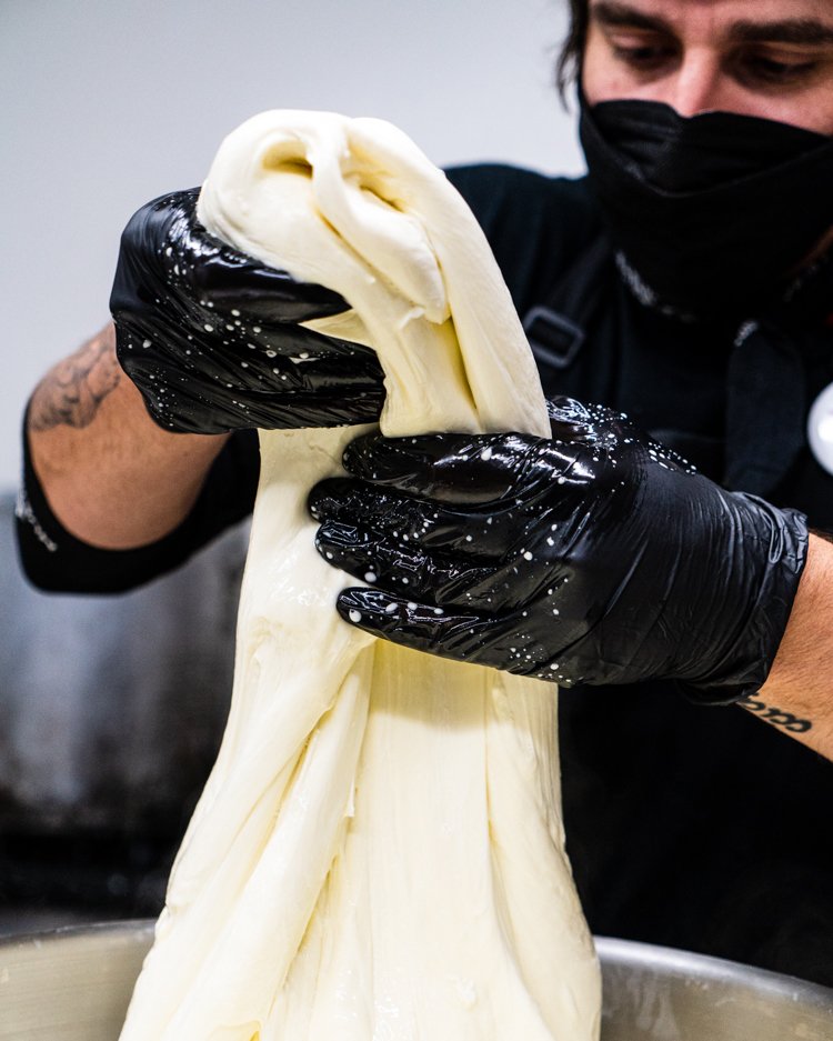  Hand-rolled mozzarella begins with lots of steam, and ensuring the cheese is the right temperature before rolling.  