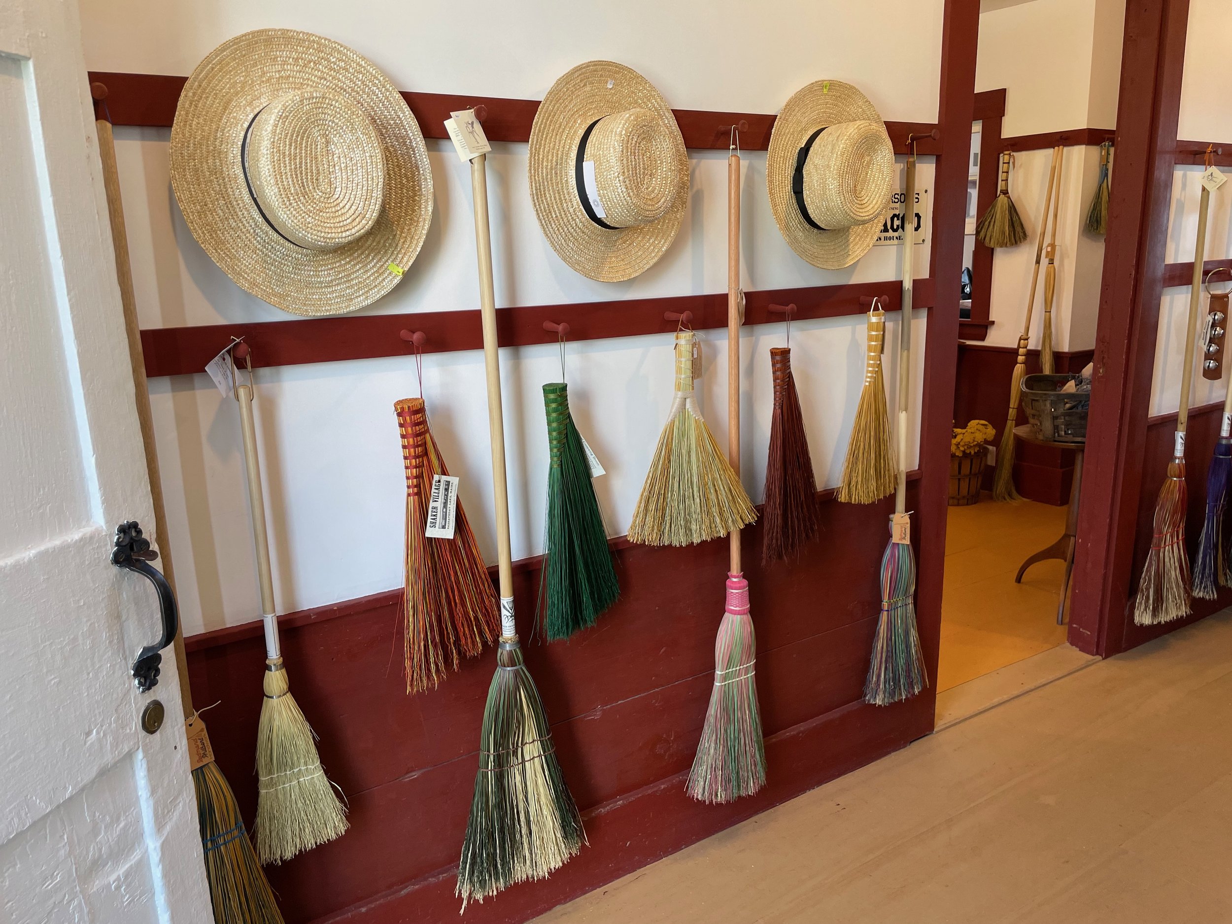   Lovely display of hats and brooms at the Shaker Village gift shop.   
