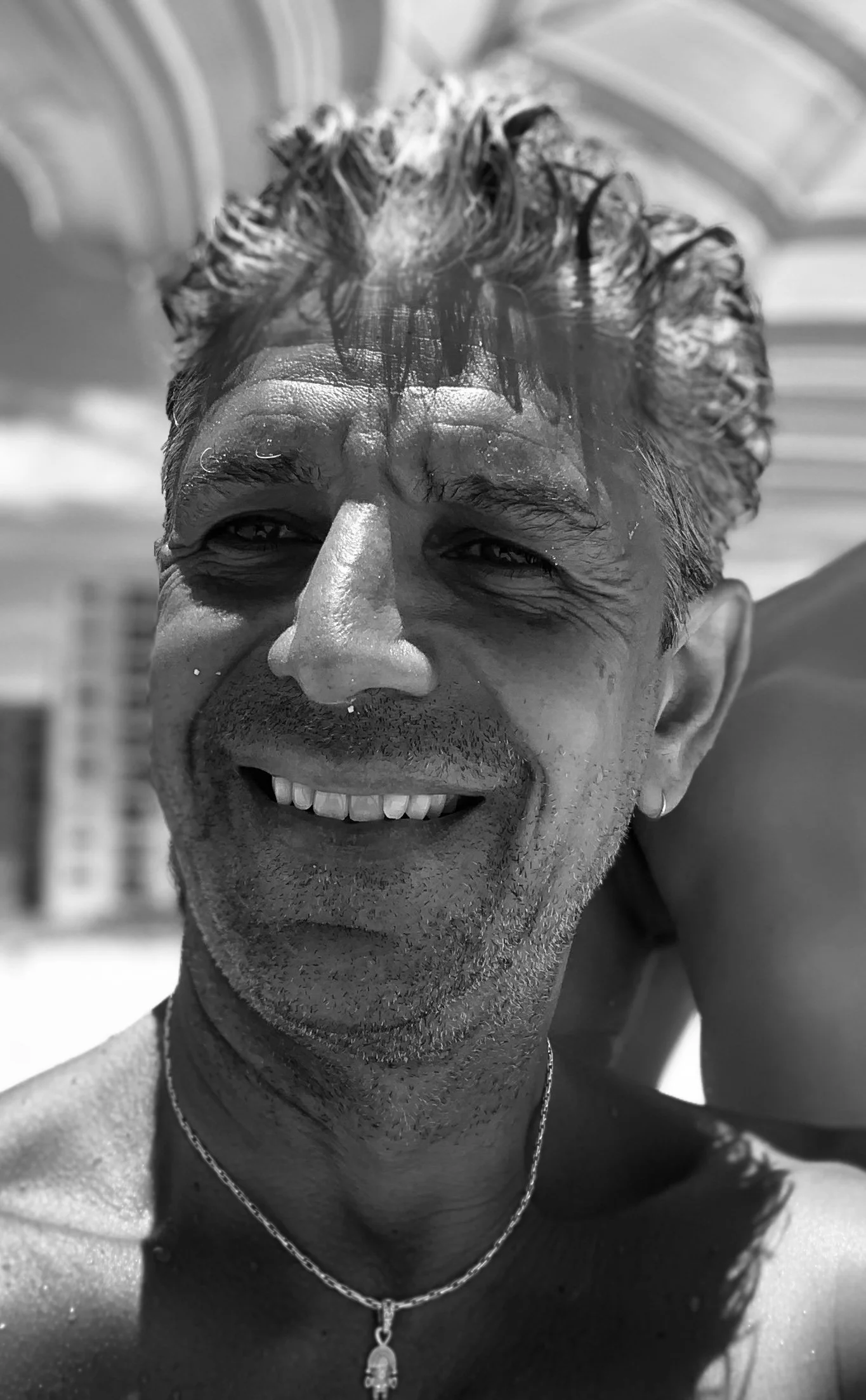 A radiant close-up of a gentleman basking in the sunshine.