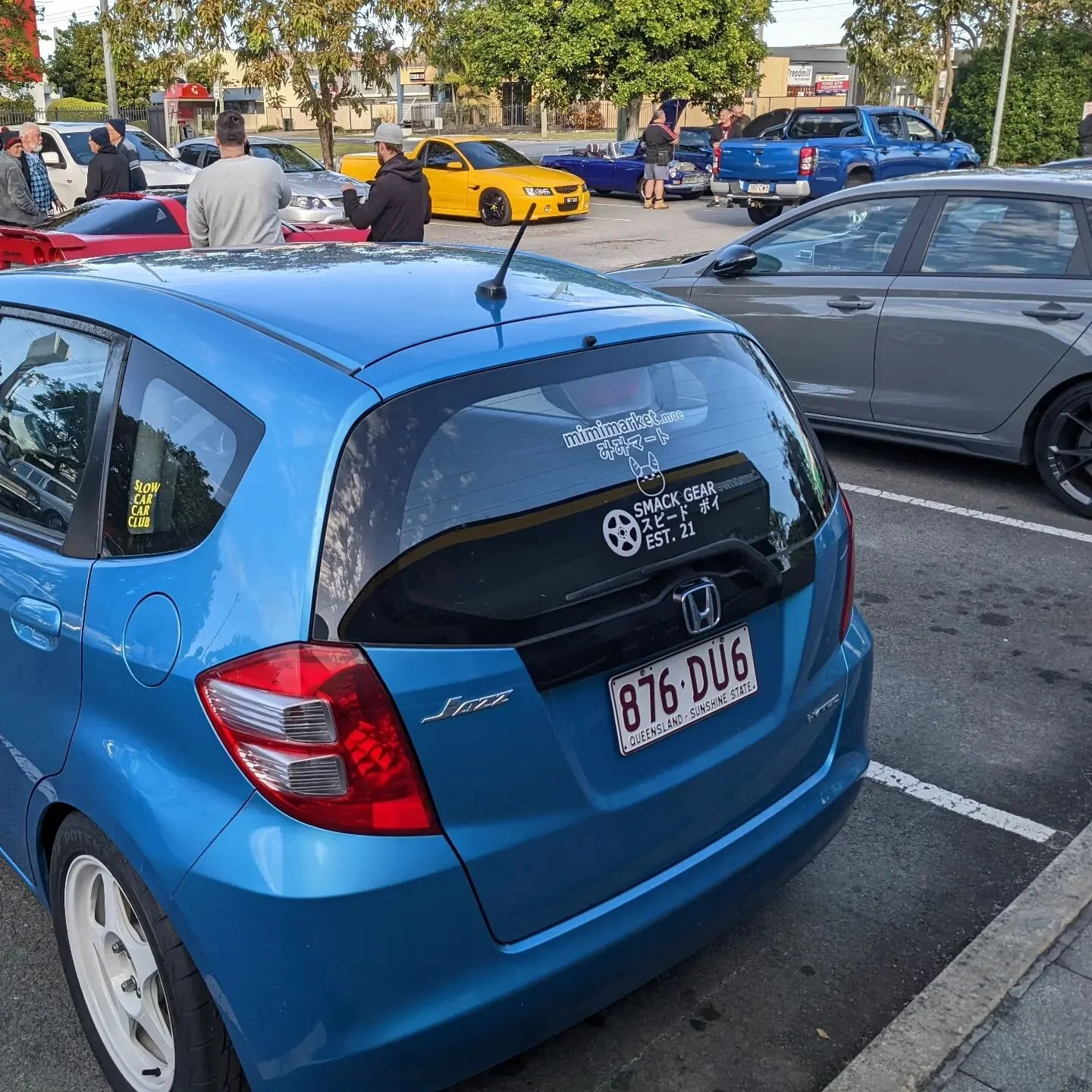 Showing off the new SMACK gear and slow car car club decals at cars and coffee