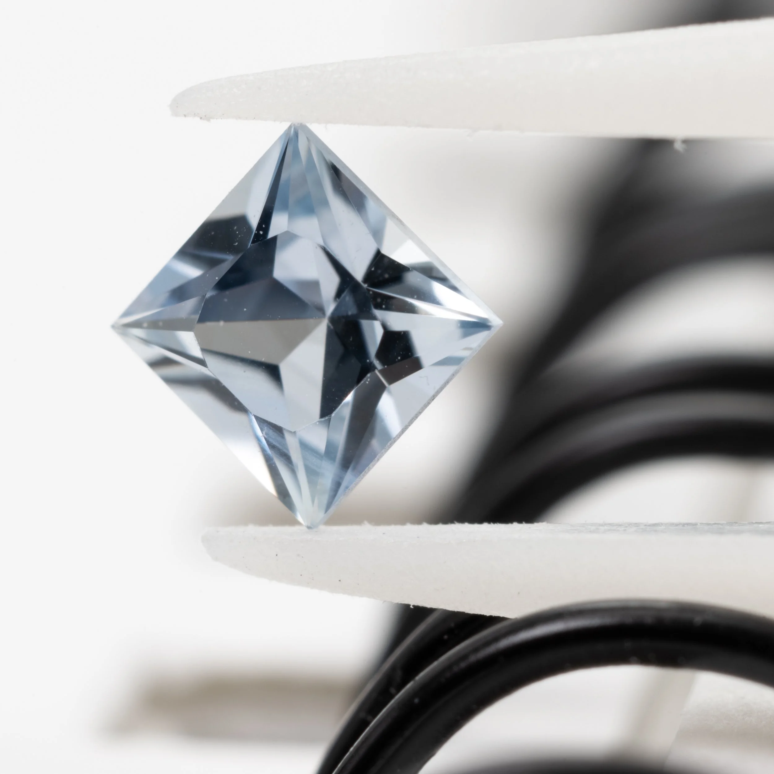 blue-sapphire-0280ct-cushion-in-a-square-v2-4.jpg