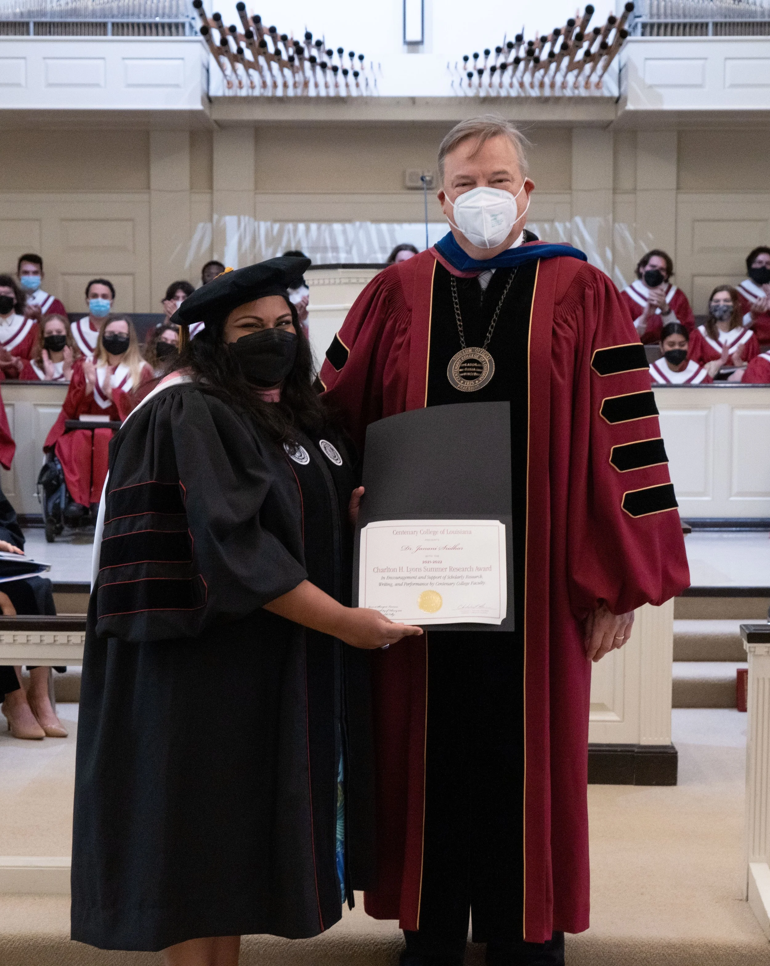 Photograph of Dr. Sridhar with President Holoman