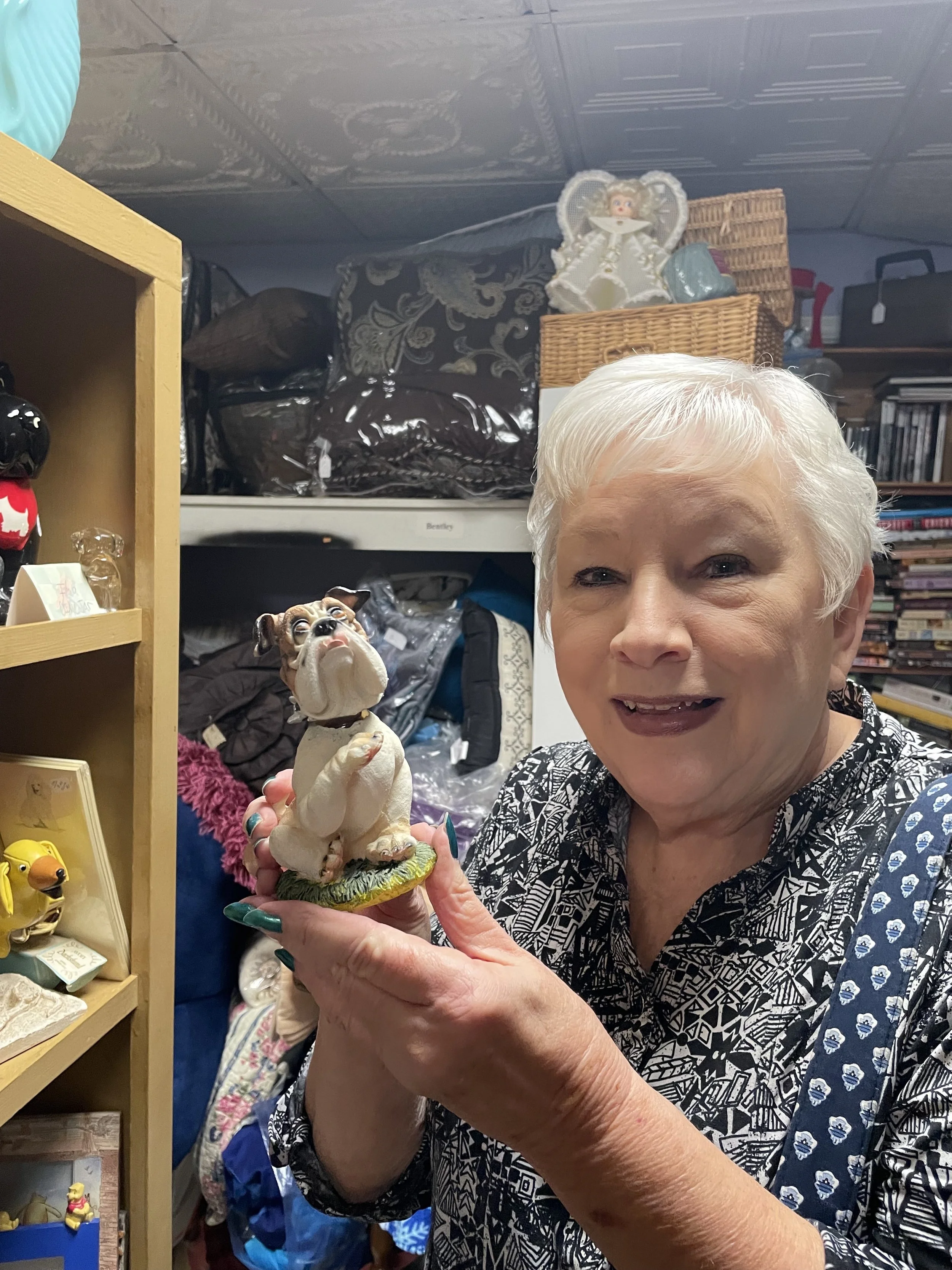 Image of Nana with a bulldog figurine.