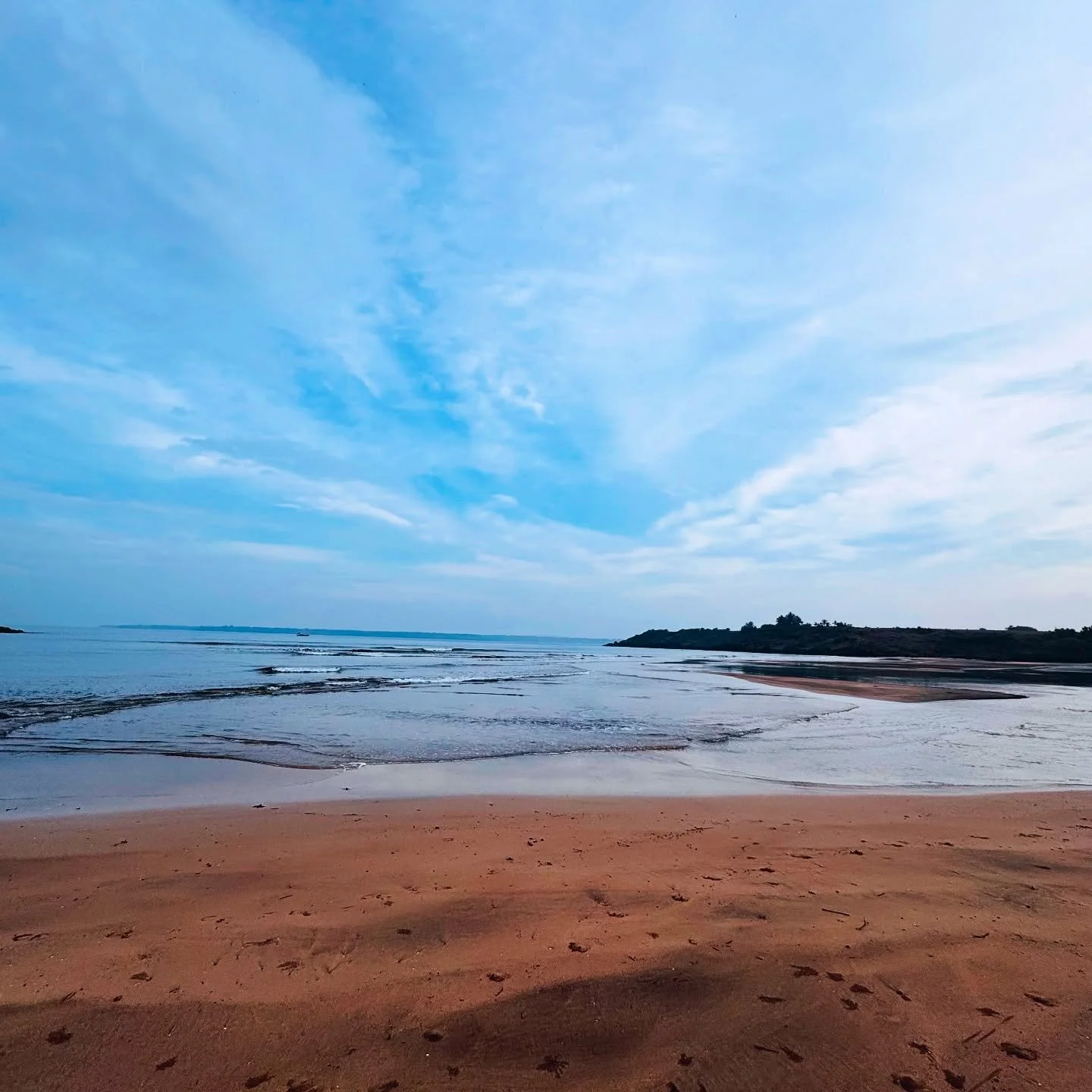 &hellip;::T H E  B E A C H::..
.
.

Beneath a canvas brushed with blue,
The sea unfolds, its endless hue.
A quiet stretch of golden sand,
Imprinted softly by time&rsquo;s hand.

The sky breathes whispers, calm yet vast,
A fleeting glimpse of moments 