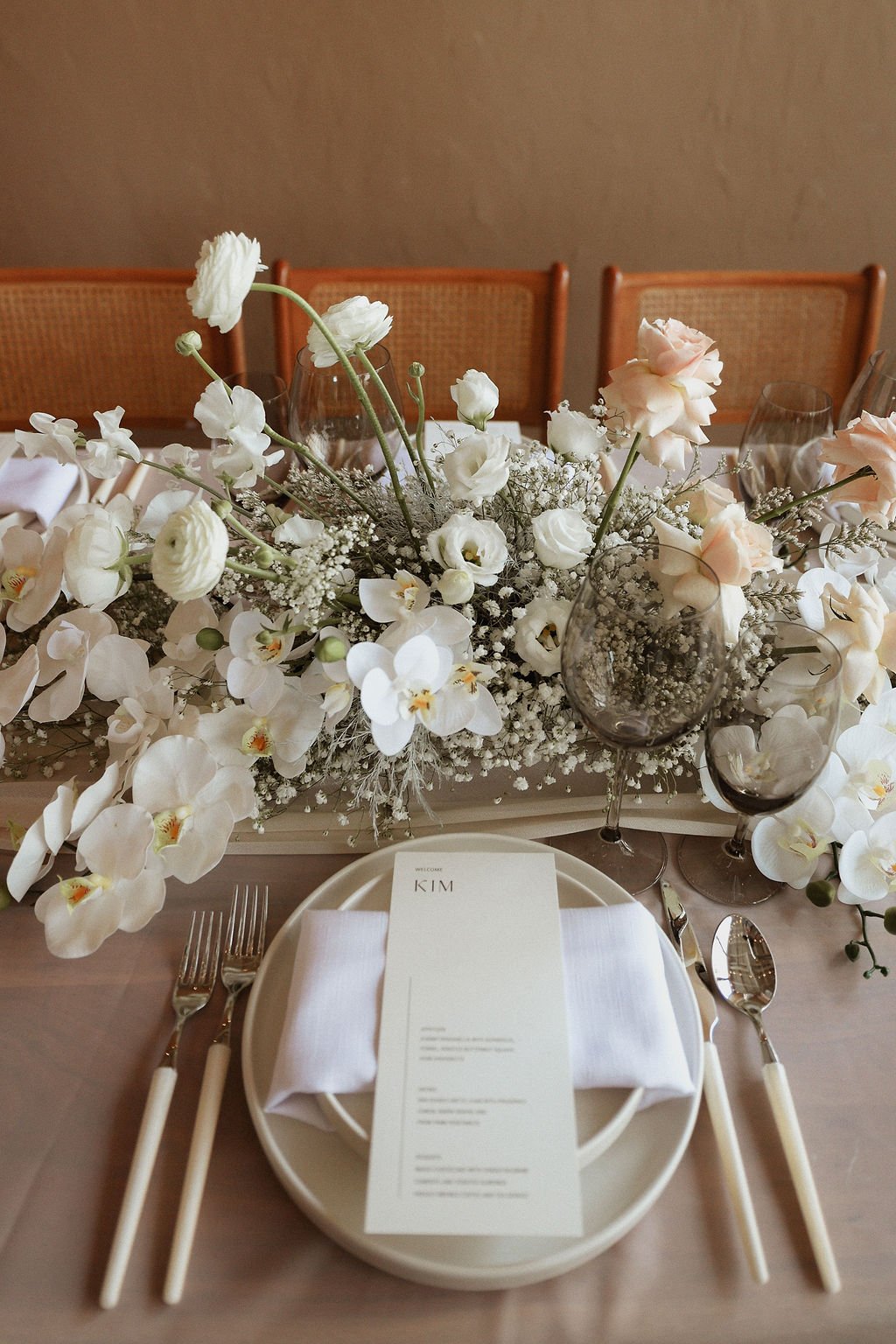 modern and contemporary flower arrangement for reception table decor