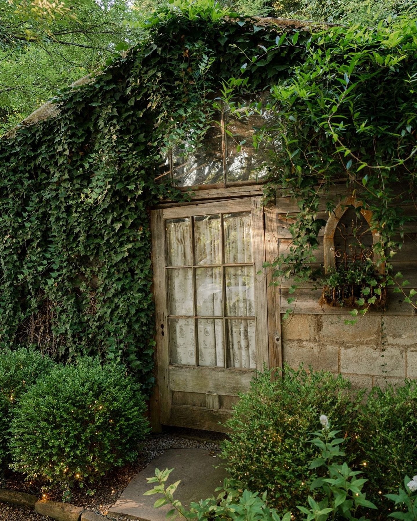 This is an original greenhouse on the property. We call it &ldquo;Mrs. Varnell&rsquo;s Greenhouse&rdquo; because the Varnell family was the original owners. This greenhouse makes a beautiful backdrop for photos. It&rsquo;s extra gorgeous in the summe