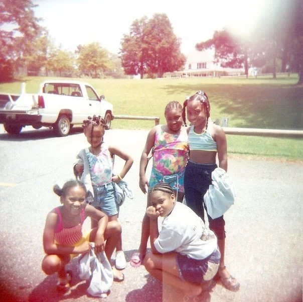 Me (bottom left hand corner) with my cousins. (age 5)