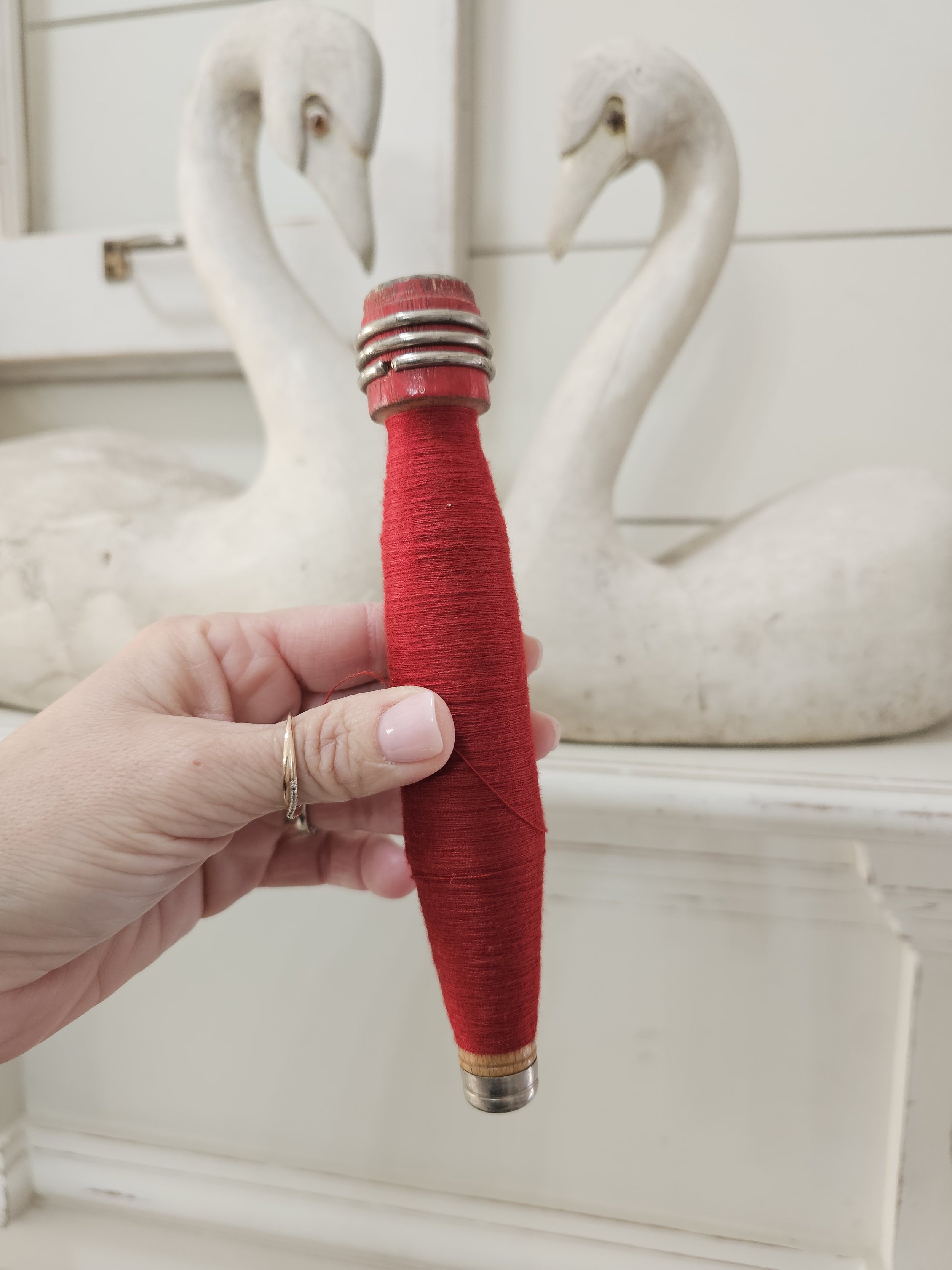 red vintage thread bobbin