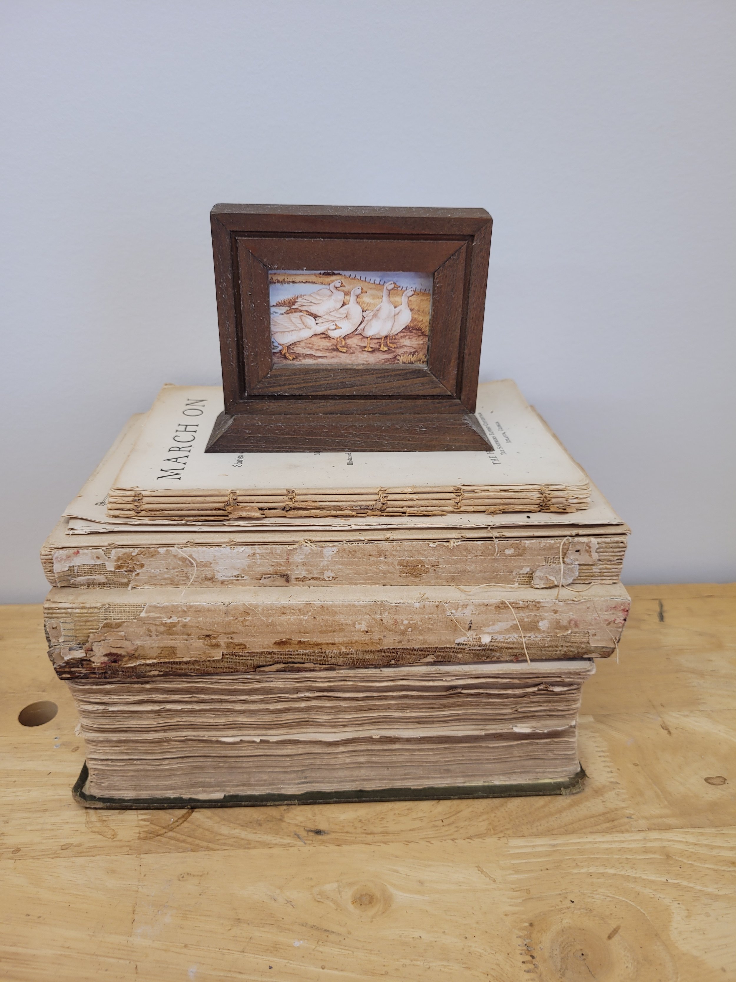 small wooden frame with gooses