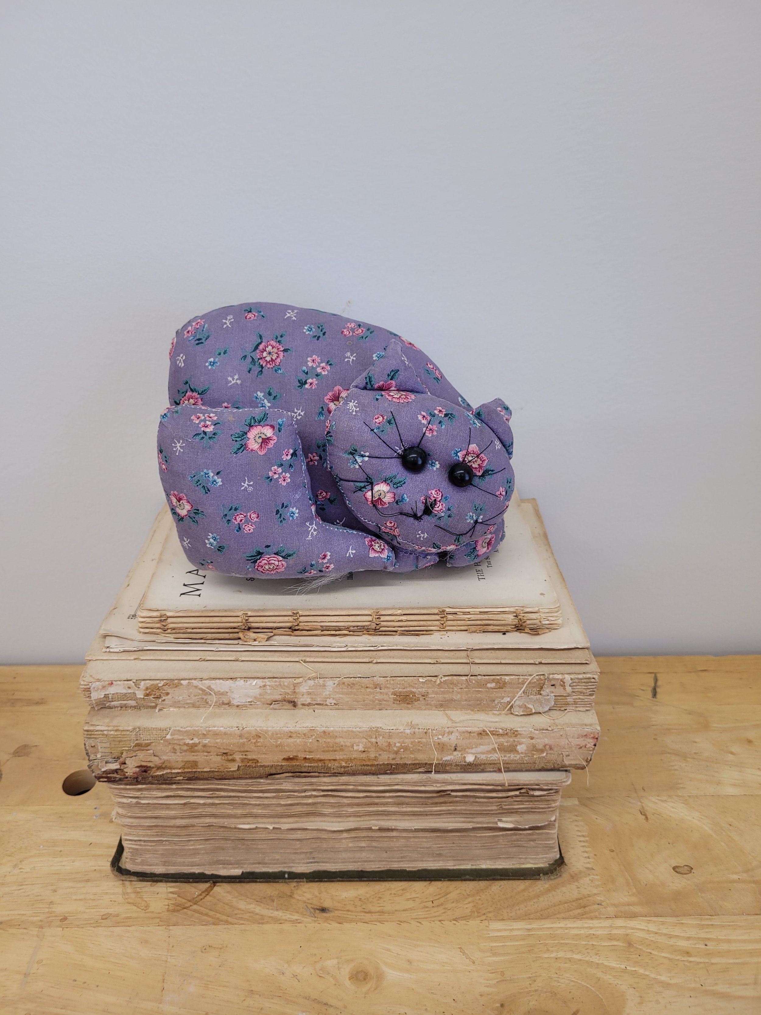 purple floral cat door stop