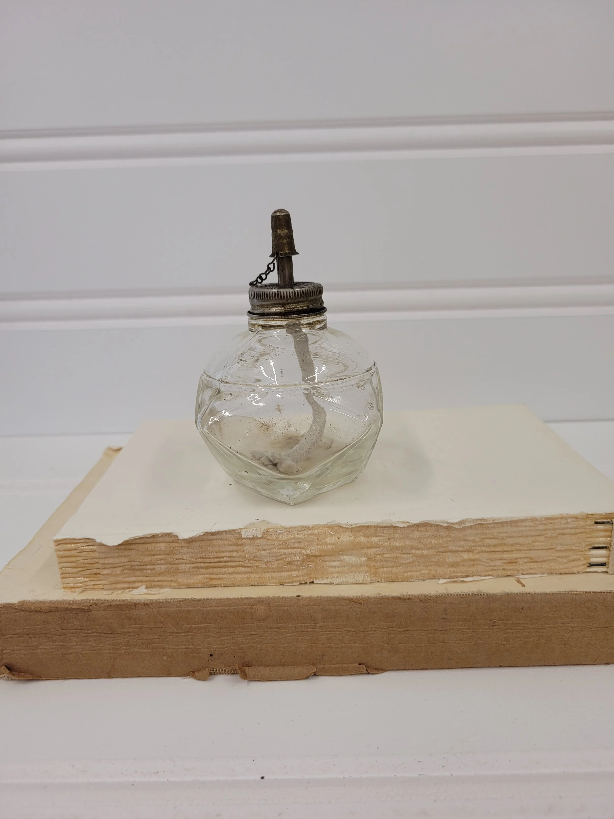 small glass oil lamp