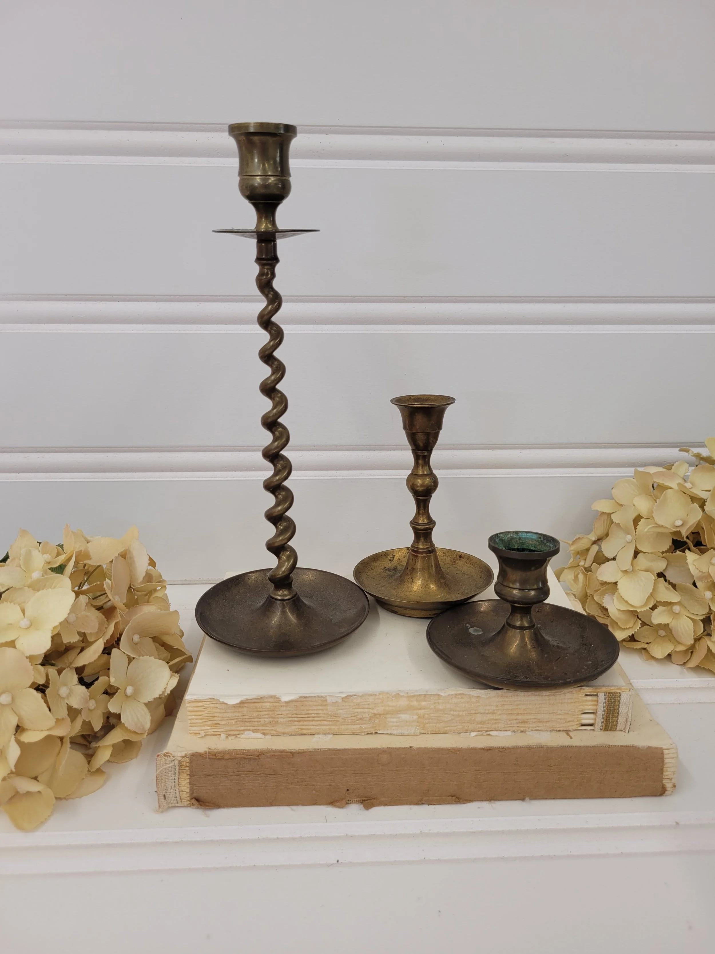 set of 3 brass candlesticks