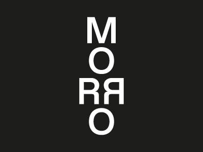 The word 'MORRO' written vertically in white text on a black background.