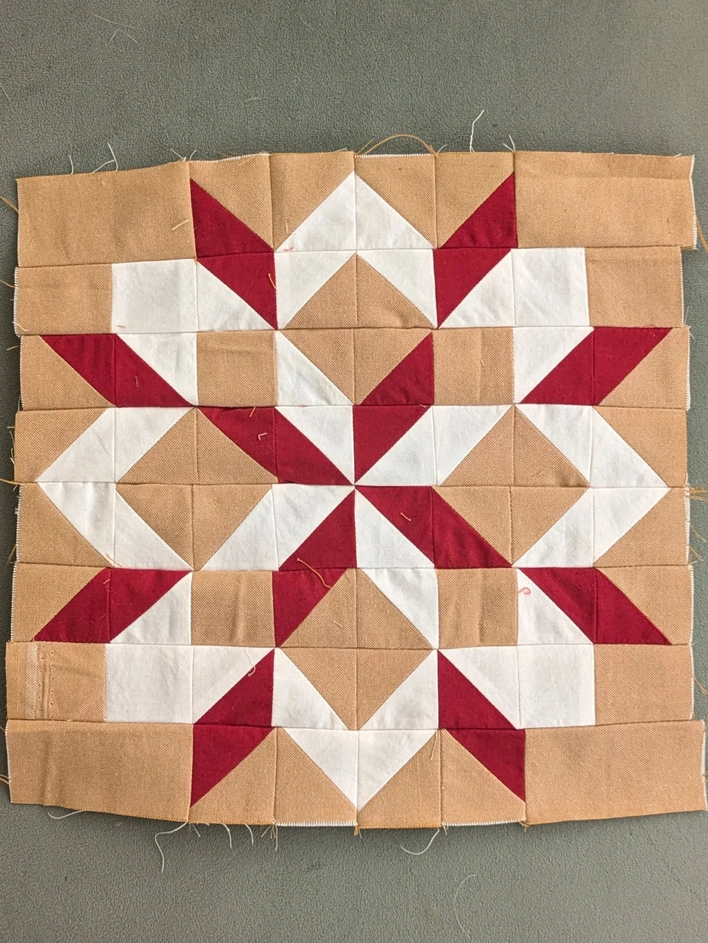 My first attempt at ever making a traditional block used similarly sized pieces to this one, and I'm pretty sure not a single point lined up. My HSTs were round somehow? Nothing was square. This is far from perfect but I'm so proud of myself for stic