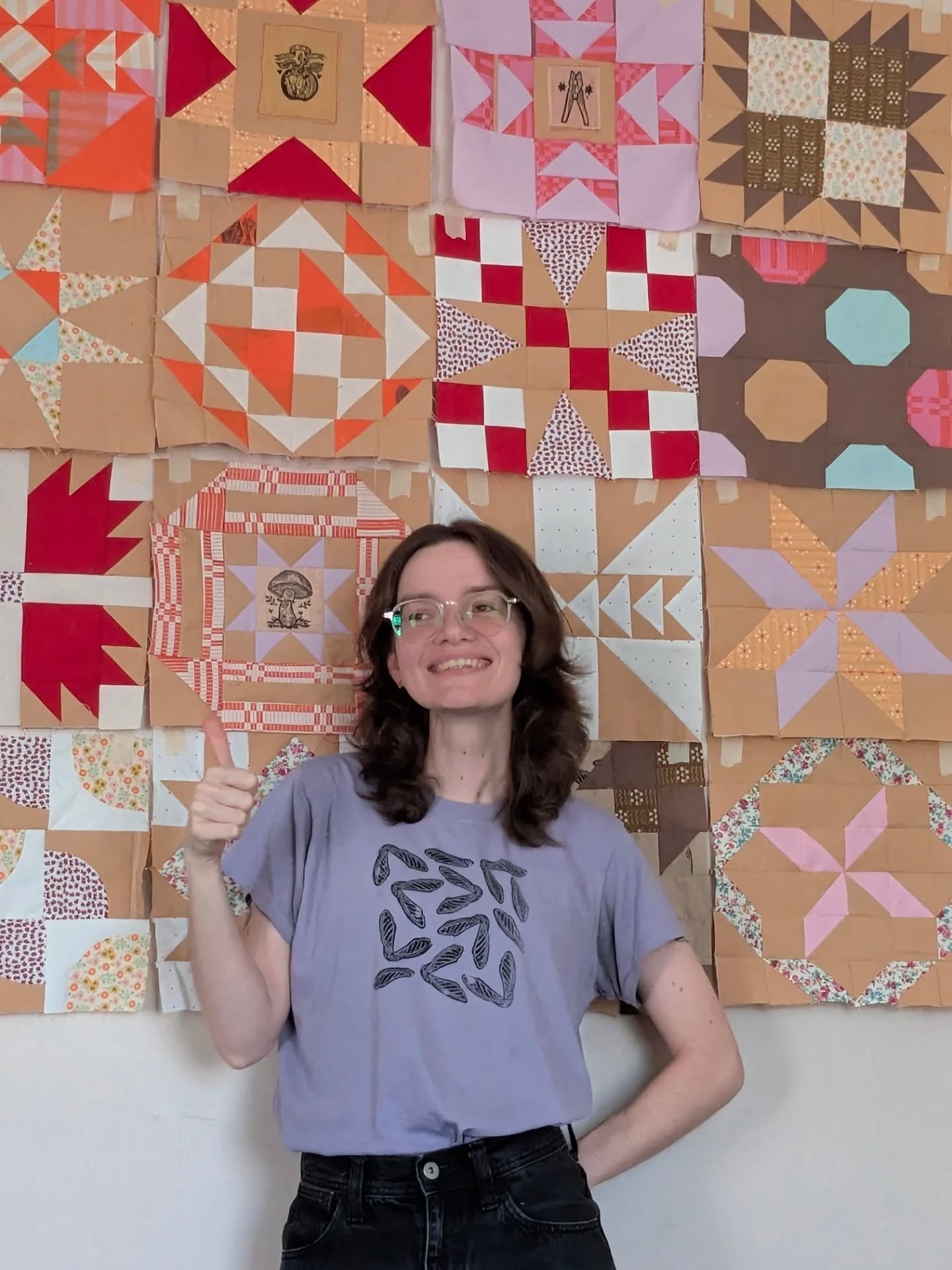 Wow these guys look so Large with a person in the frame with them!! I just finished block #16 (seen to my left) and I really enjoyed the square-ish-ness of what I have so far. I'm looking forward to... 🥺 the last four blocks 🥹

#folksamplersewalong