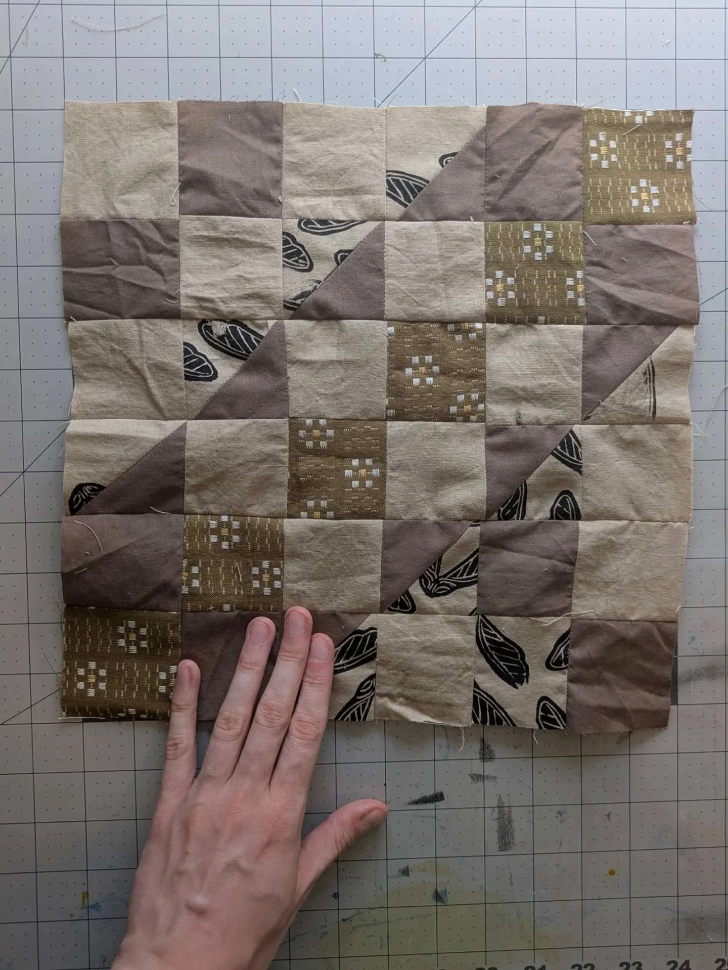What a fun block! I love the reminder of the versatility of squares and HSTs 🙂&zwj;↕️ This is a special block because I dyed the tan with black walnut hulls last month at my aunt's house! And then last month I also screenprinted some maple seeds on 