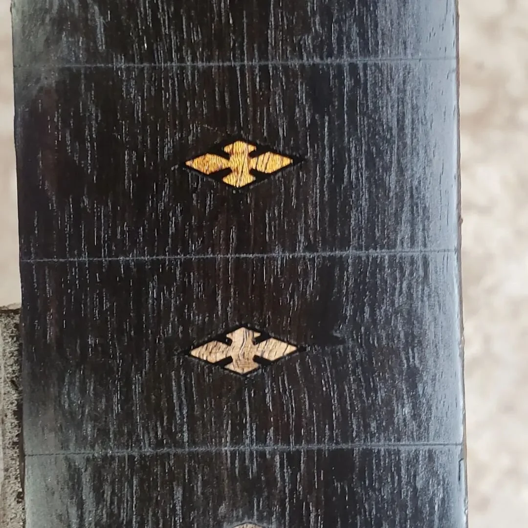 Notched diamond fret markers in mahogany and walnut!  Finally got the process down, but had to build a miniature table saw... its the most terrifying tool in my shop currently. These are going into the next batch of spun over banjos. 

#smallshop #cl