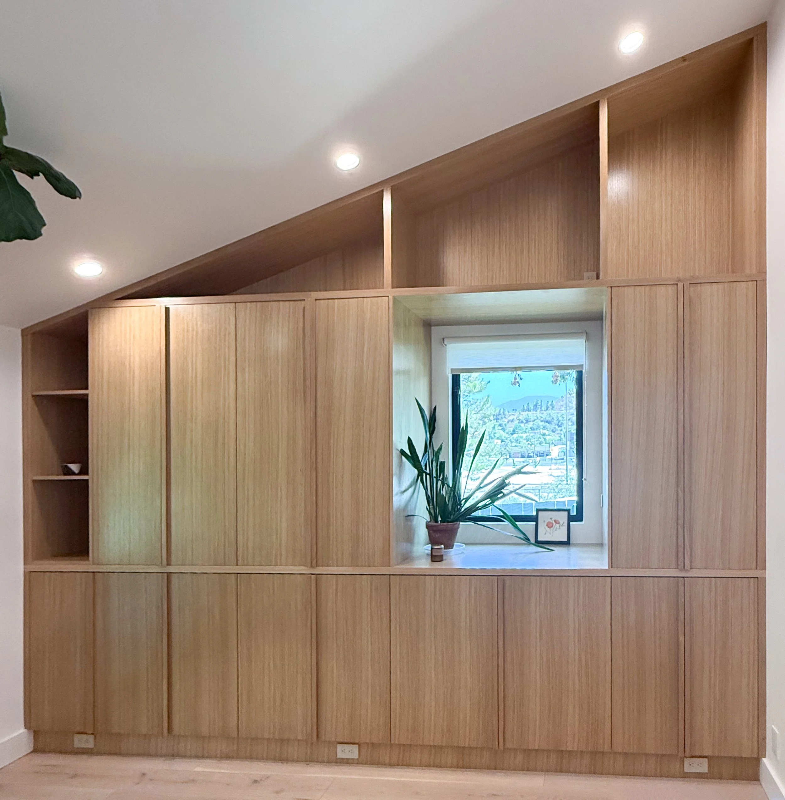 Sloped Ceiling Oak Built In with Integrated Pulls