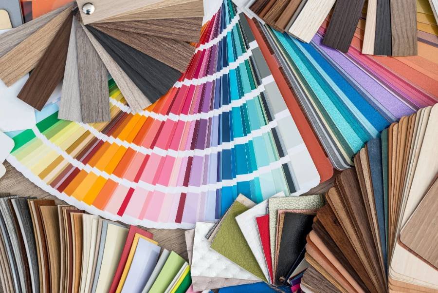 Paint color swatch fan deck with wood and fabric samples