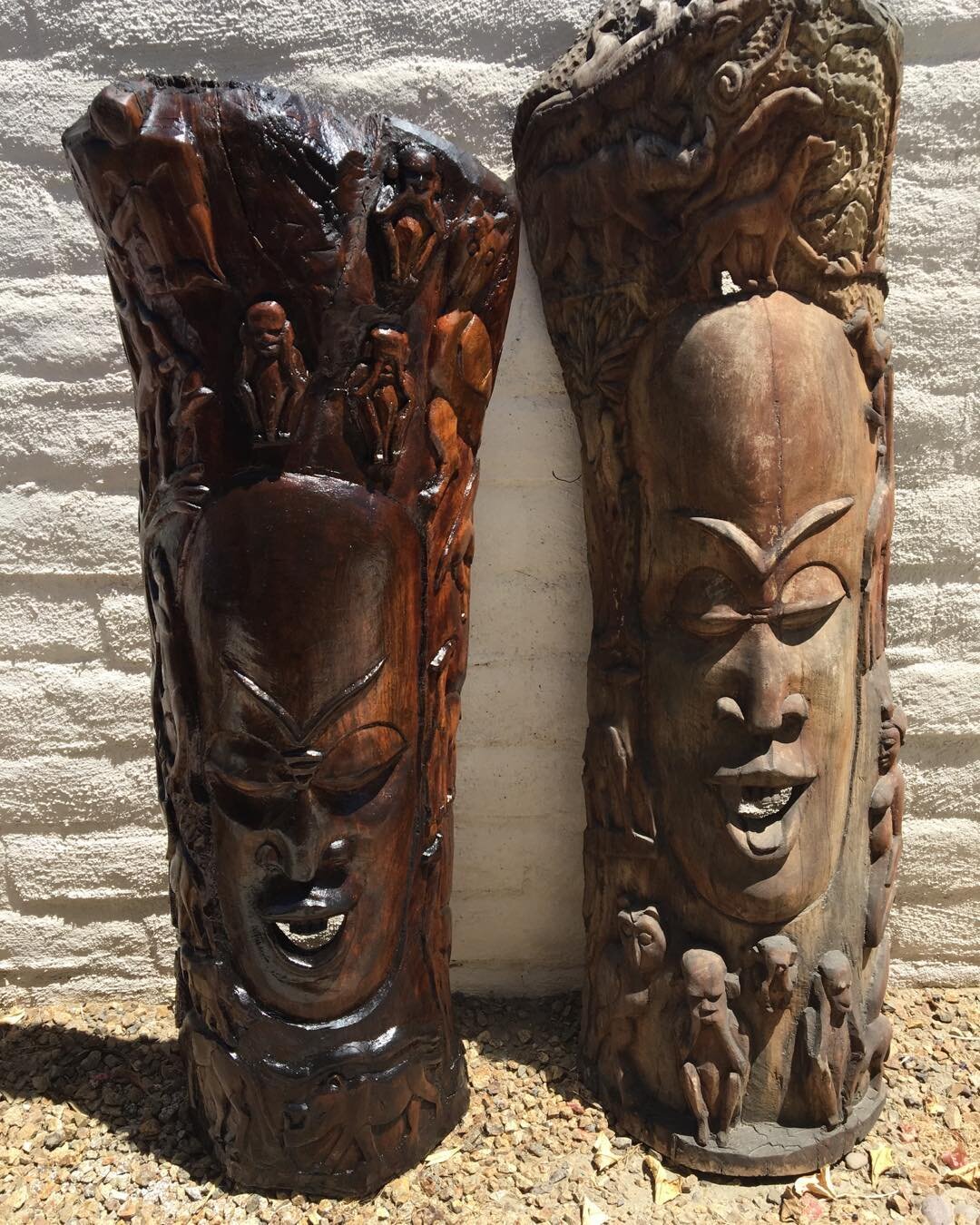 Acquired these carvings over 10 yrs. ago from some Senegalese friends. Every year since I give them a coating of shea butter to bring back their natural wood color and quench their thirst from the heat. Before and after. The one on the right will be 