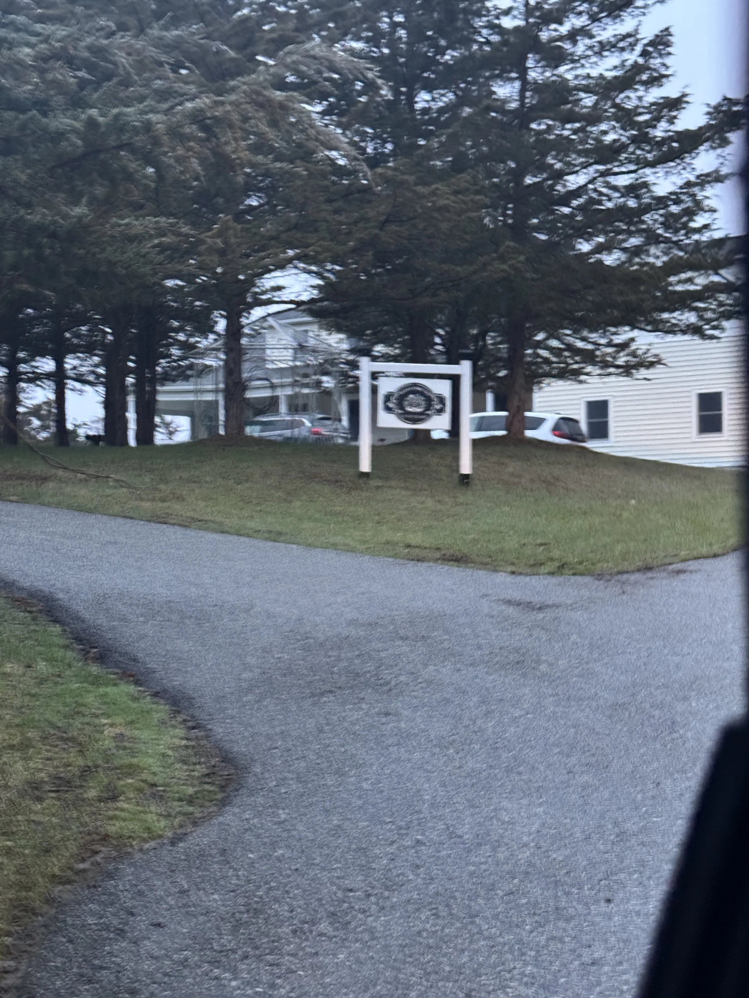 When you see this sign coming up the driveway, TURN LEFT to go to the barn if you are infirm/elderly, delivering food, entertainment or wedding party.
Turn right for all others and park in back.  Please see Parking Instructions in the menu above
