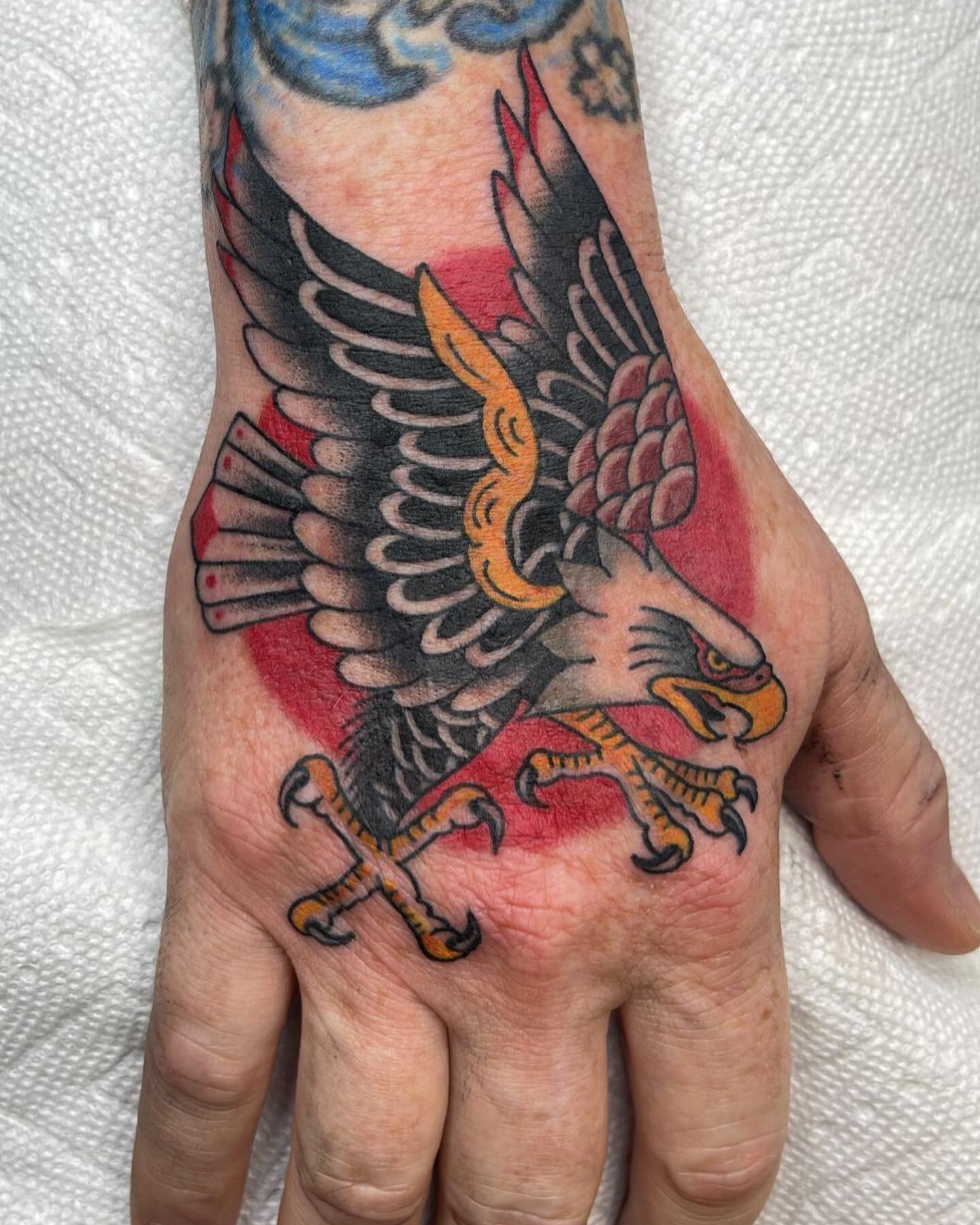 Eagle Hand Tattoo done by @hollimarieart the client today was the one and only @cory3rdtattoos #eagle #handtattoo #tattoo #tattooartist #color #flatstattoo