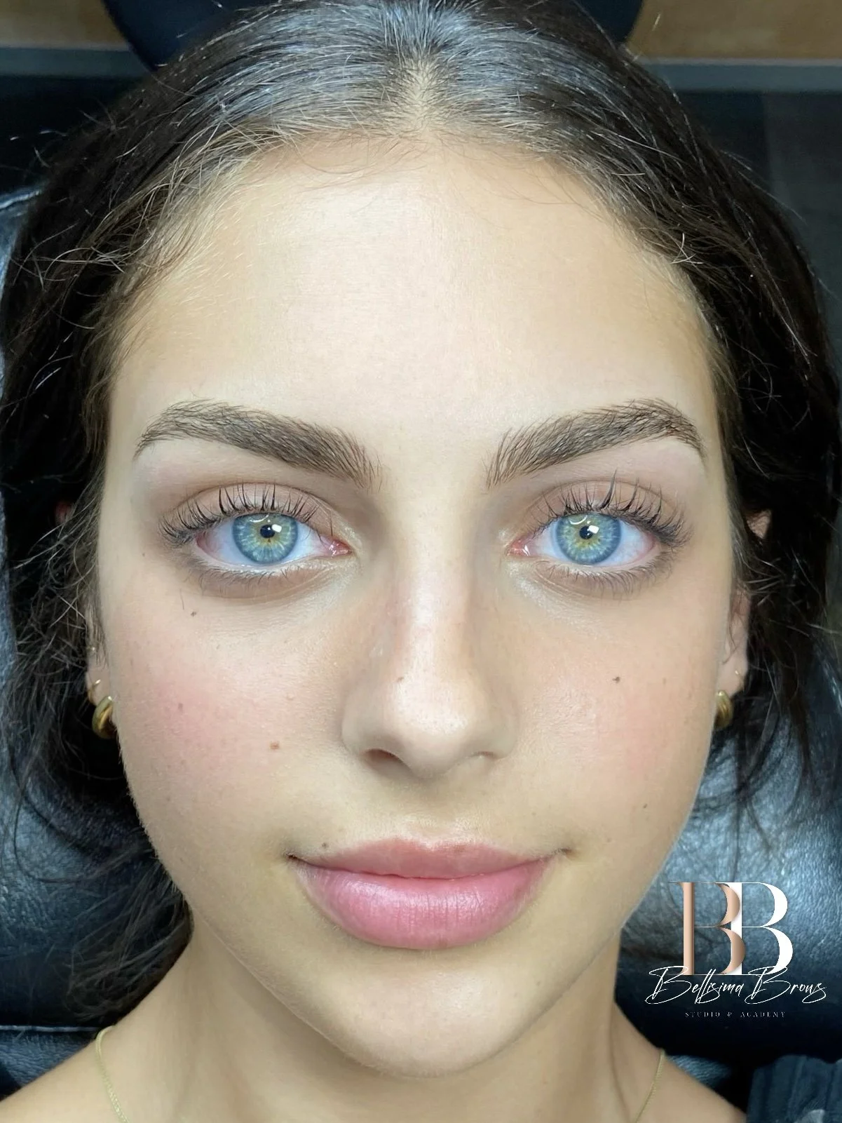 Close-up of natural Combination Brows procedure by Bellisima Brows in Manhattan, showcasing realistic hair strokes and shading, permanent makeup excellence result.