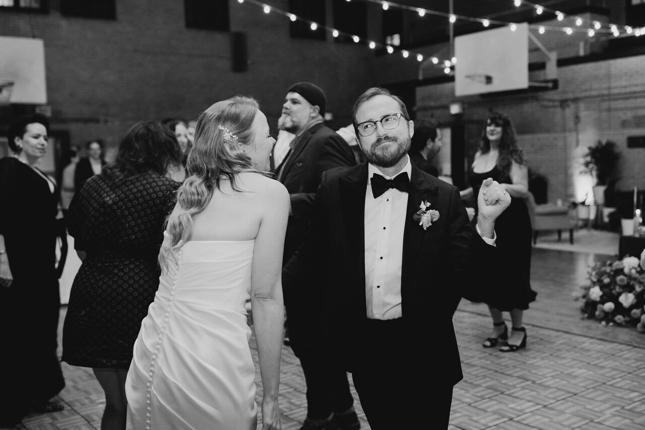 103-couple-dancing-together-string-lights-bok-gymnasium-philadelphia.jpg