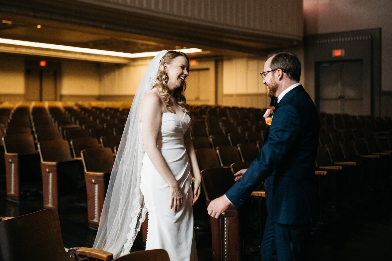 015-first-look-couple-embrace-auditorium-bok-philadelphia.jpg