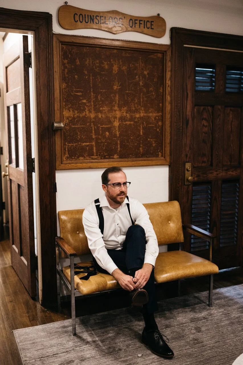 008-groom-getting-ready-counselors-office-bok-philadelphia.jpg