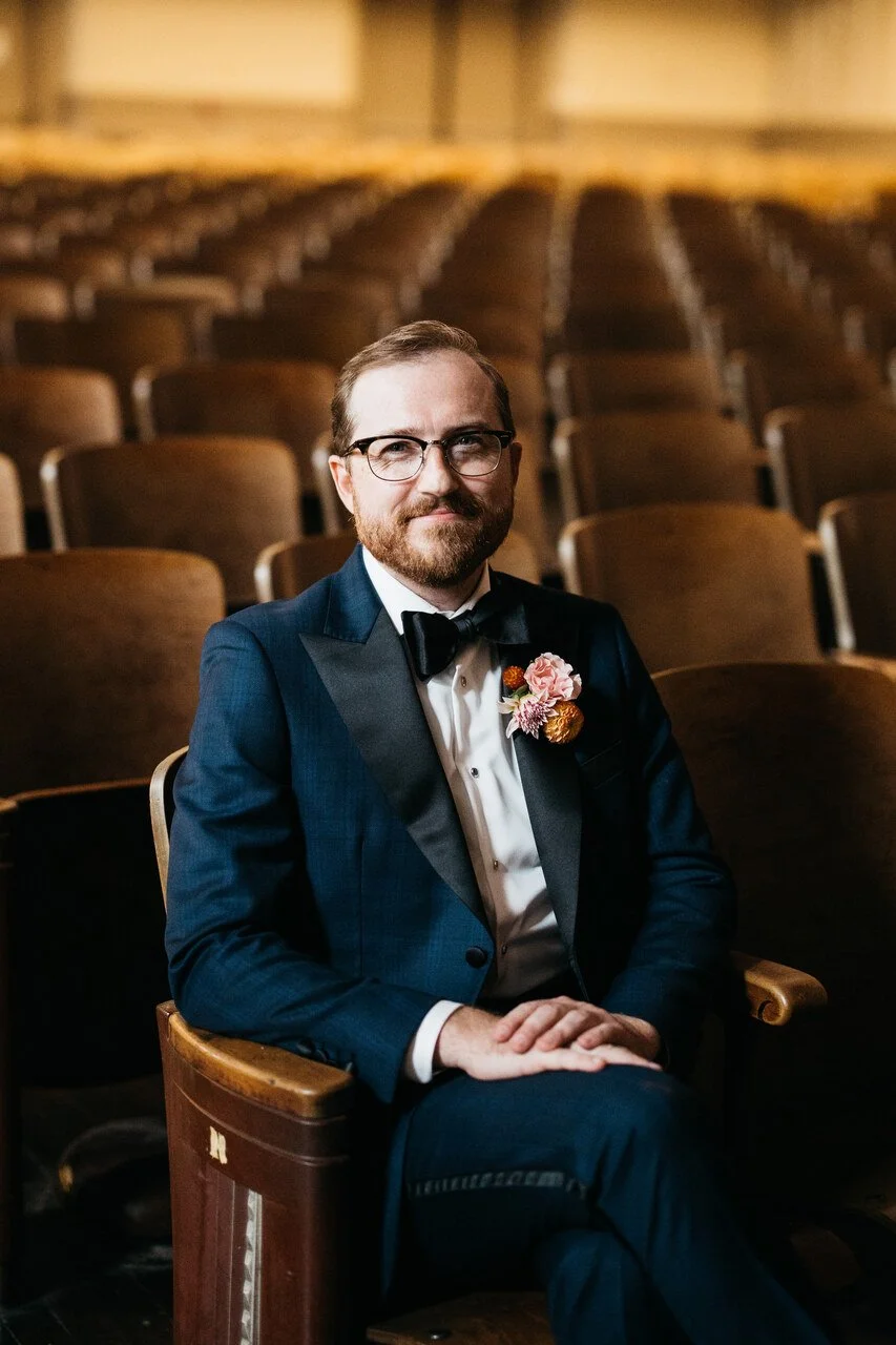 020-groom-portrait-seated-auditorium-black-white-bok-philadelphia.jpg