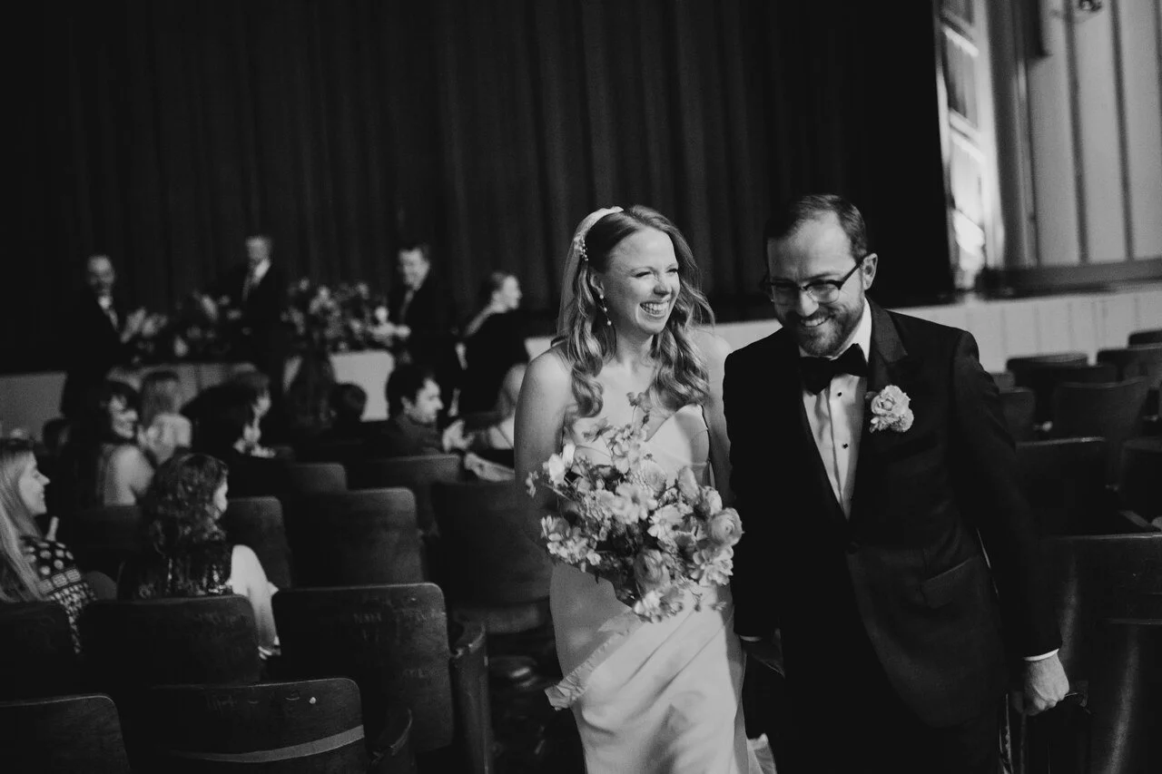 050-wedding-ceremony-recessional-couple-laughing-bok-auditorium.jpg