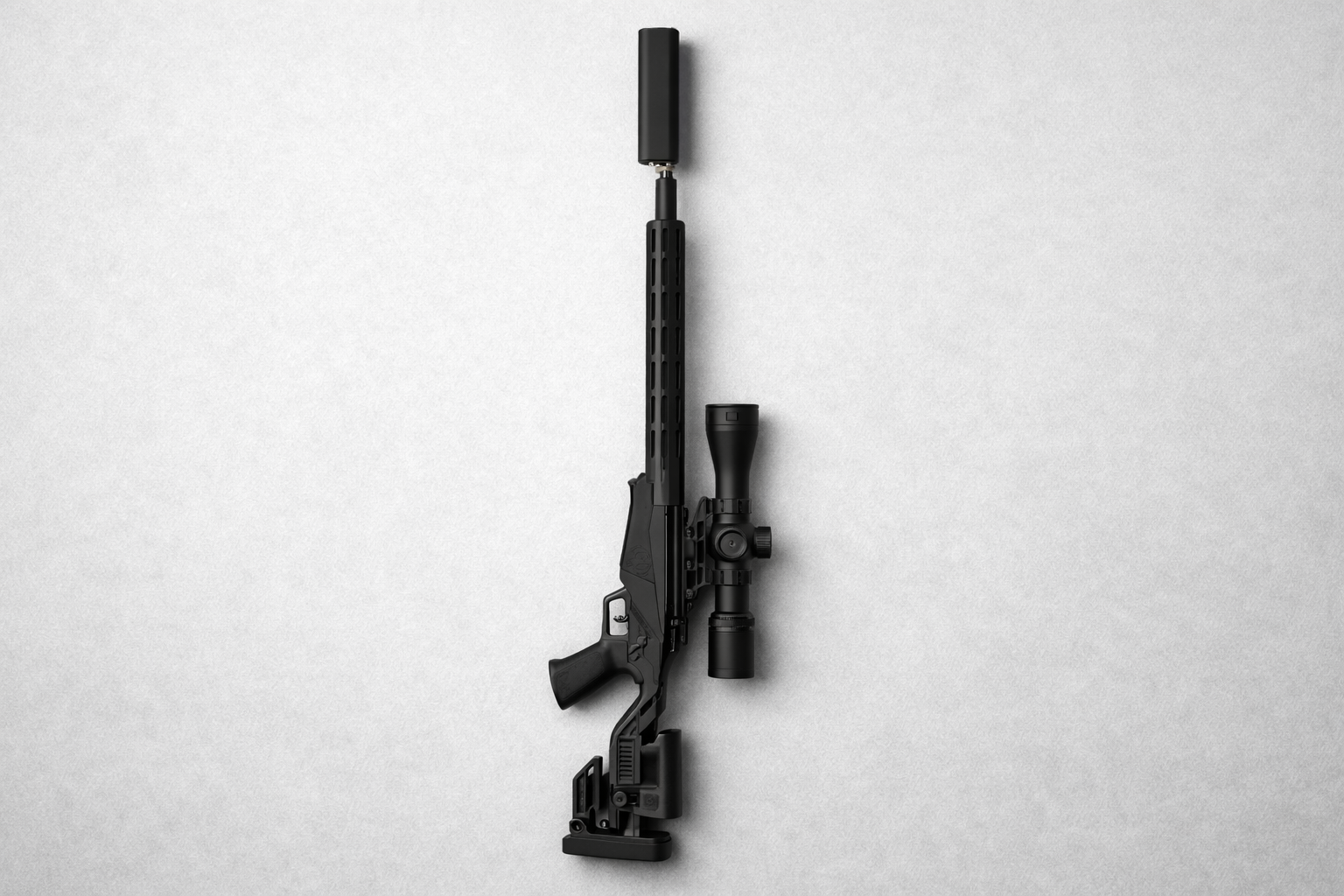 Black rifle with a scope mounted, shown vertically on a light gray background.