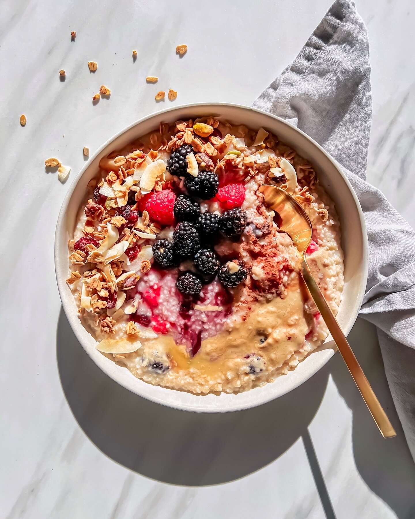 A warm comforting breakfast bowl on another chilly morning. Steel cut oatmeal with tahini and mixed berries. Top with your favorite granola from SavorySpoons ~ The Original ~ ❀

Recipe posted on site // and grab a bag of our handcrafted granola for y