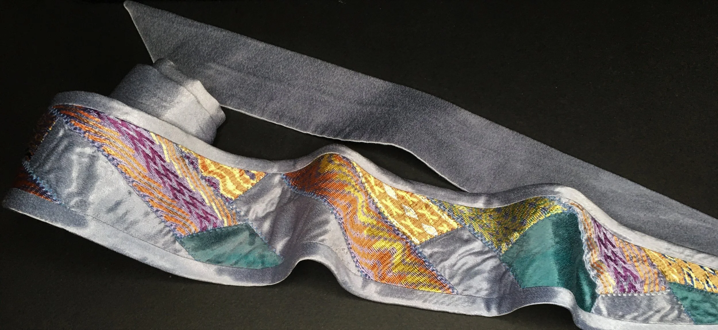 Sash created from hem trimmings of Curvature of Chords