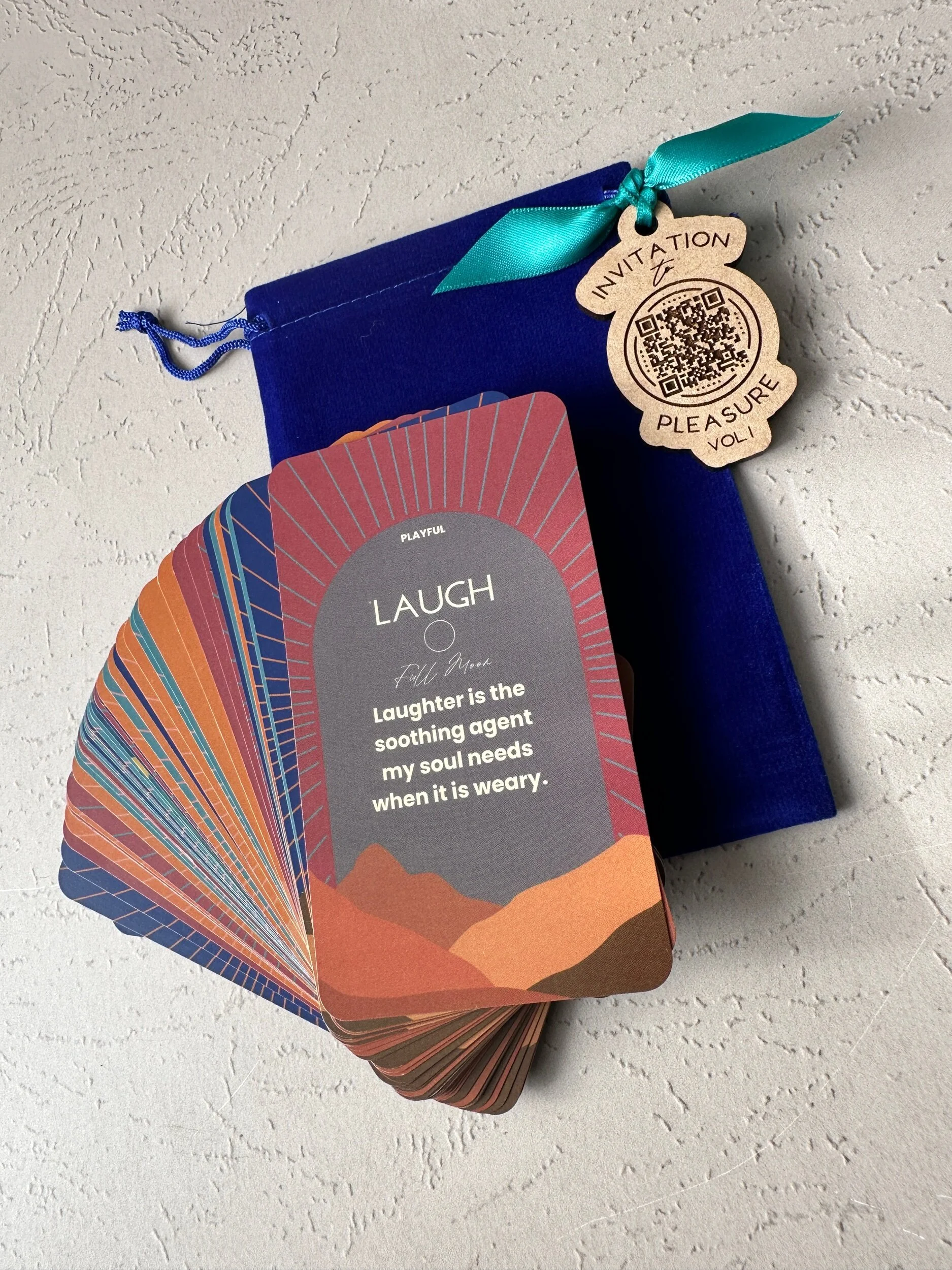 colorful oracle deck with blue velvet pouch