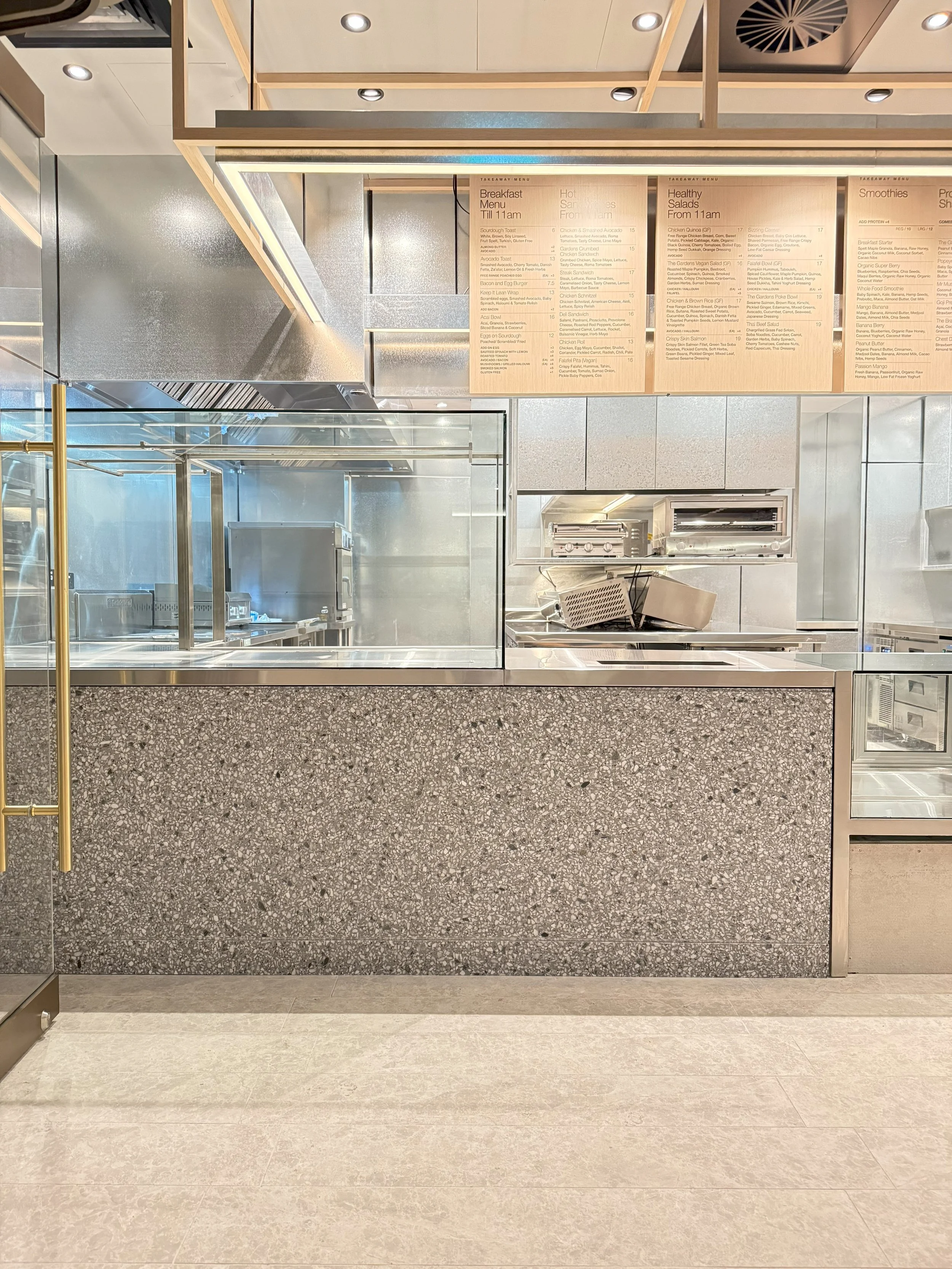 Curved terrazzo-style café counter at The Gardens, Sydney