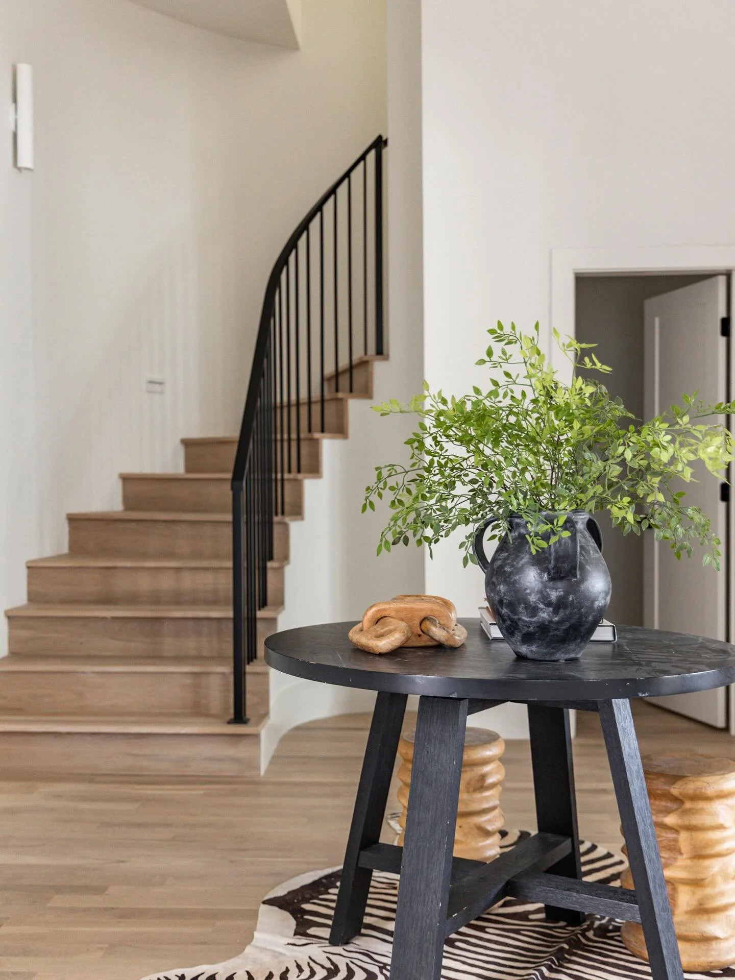 Fun foyer moment at #WabiSabi12South  spec, which old clients happened to call home now. We shot this before the foyer pendants were installed so swipe through to see them in now 🤍complimented by this beautiful drop zone builtin by⁣ @smith_construct