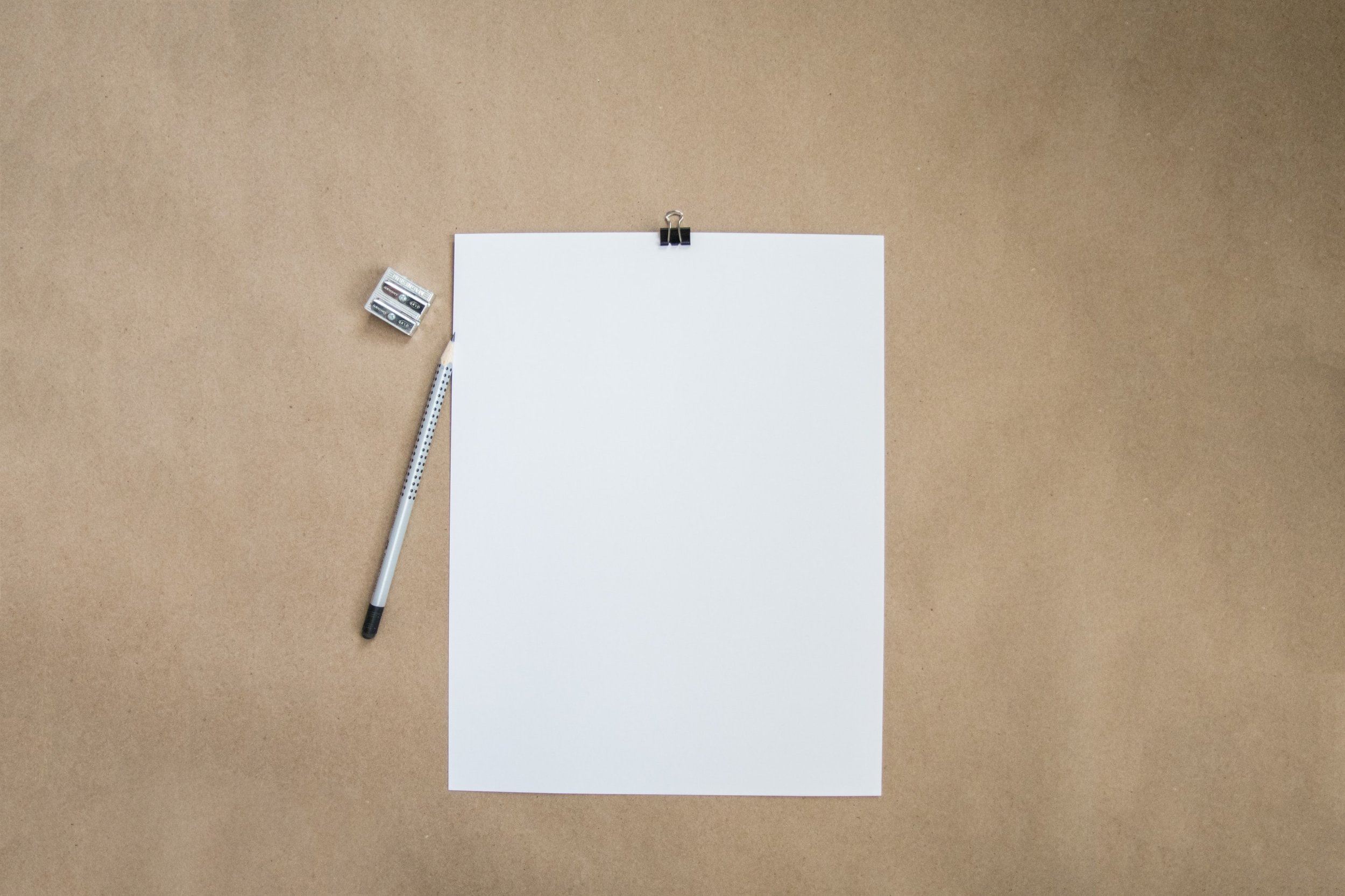image of empty paper and pencil