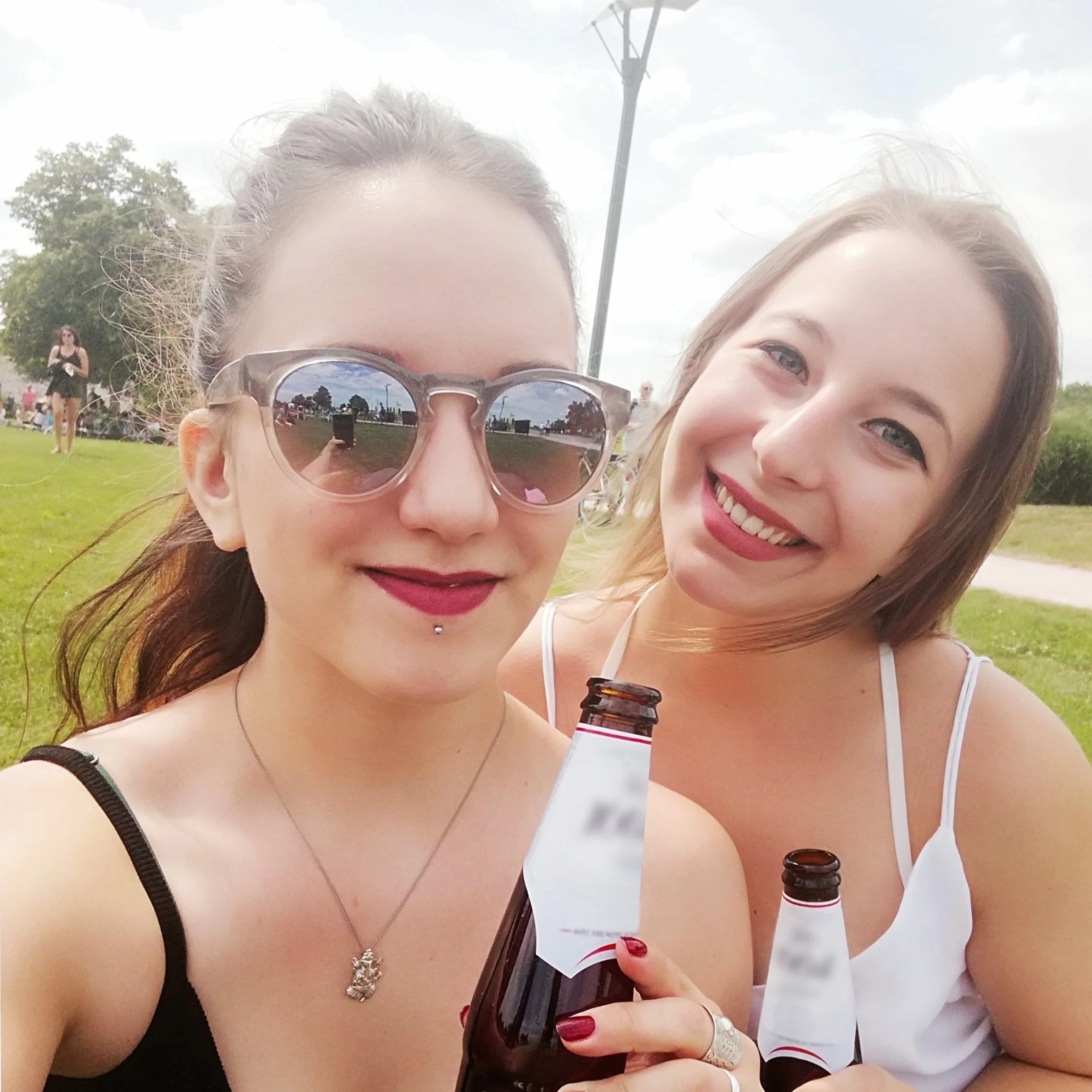 Zuzanna, with a friend at a festival, 2018.