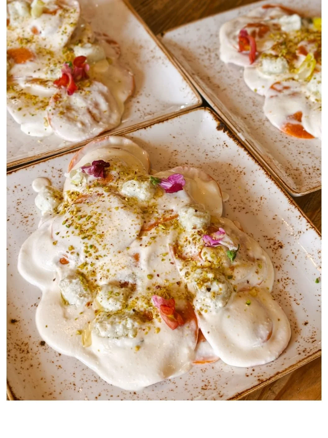 Handmade meringue dessert topped with crushed pistachio, made by a private chef in Mallorca