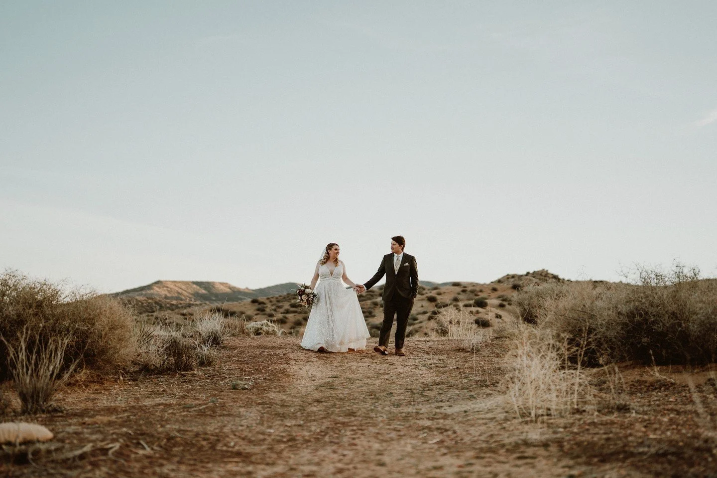 Joelle + Alex
&bull; The Creative Team &bull;⁠
Awesome Couple: @joelleadele_ + @alex_imbery
Joelle's Attire: @ruedeseinebridal + @aandbe_sacramento
Alex&rsquo;s Attire: @indochino
Venue: @rimrockranch
Florist: @rflowersandbaskets
Planner: @catieimber