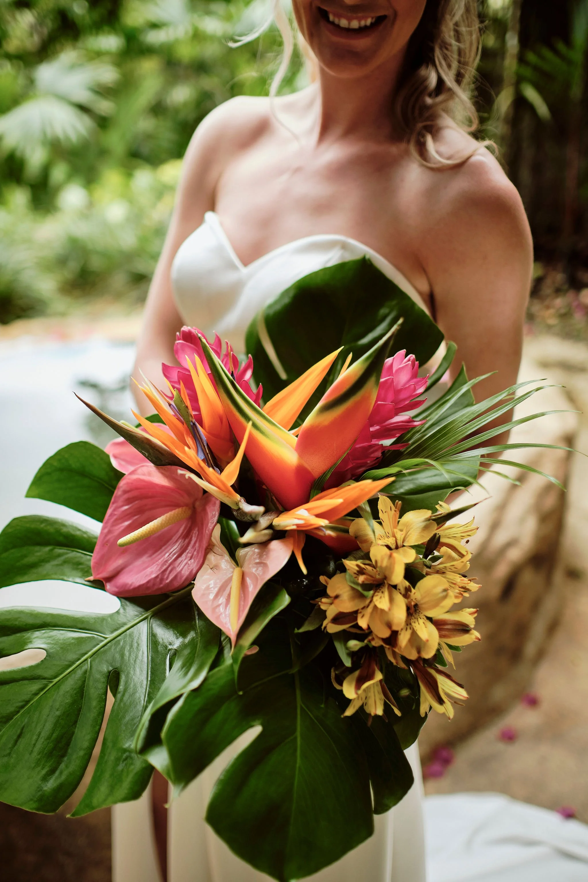 Breathtaking greenery wedding florals in Costa Rica's wild, untamed nature.