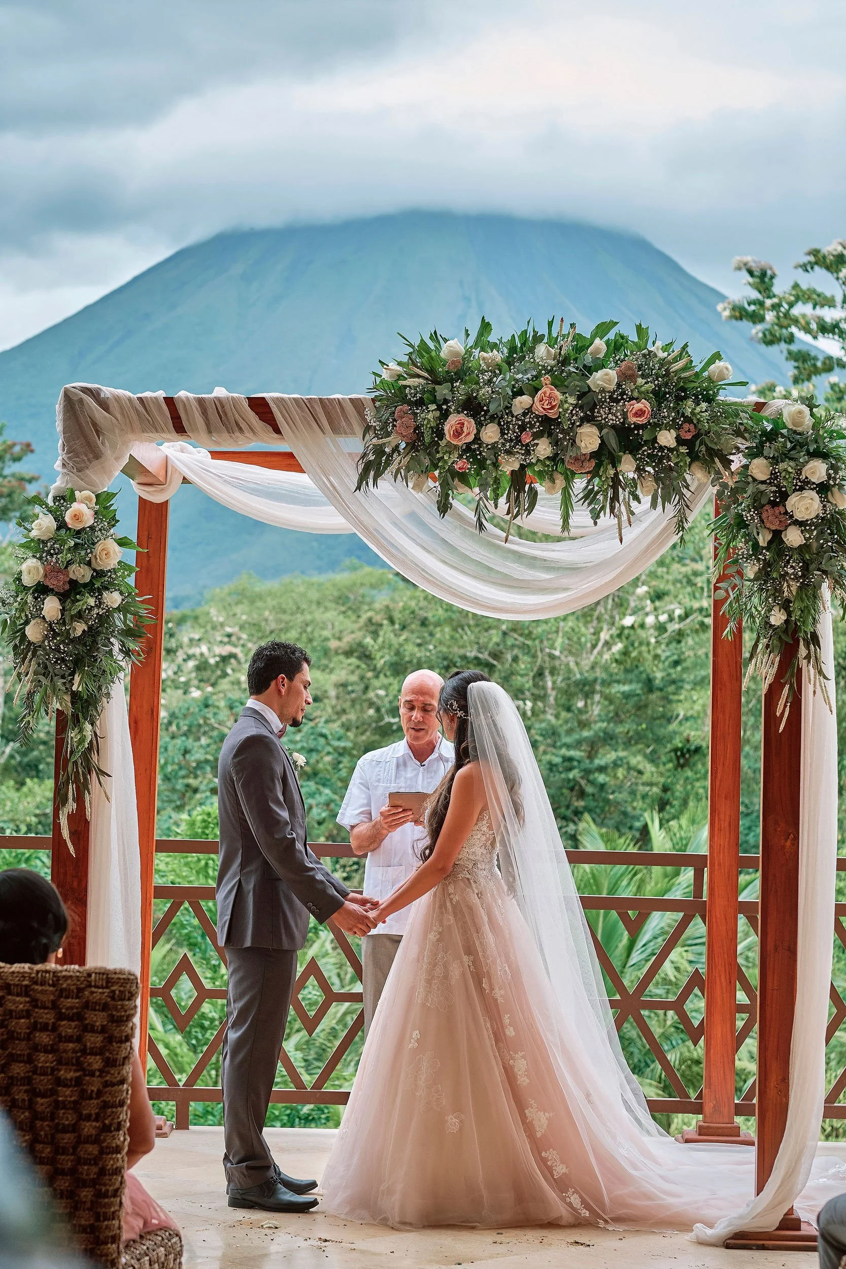 Rainforest Arena Volcano backdrop for a stunning wedding ceremony in Costa Rica.