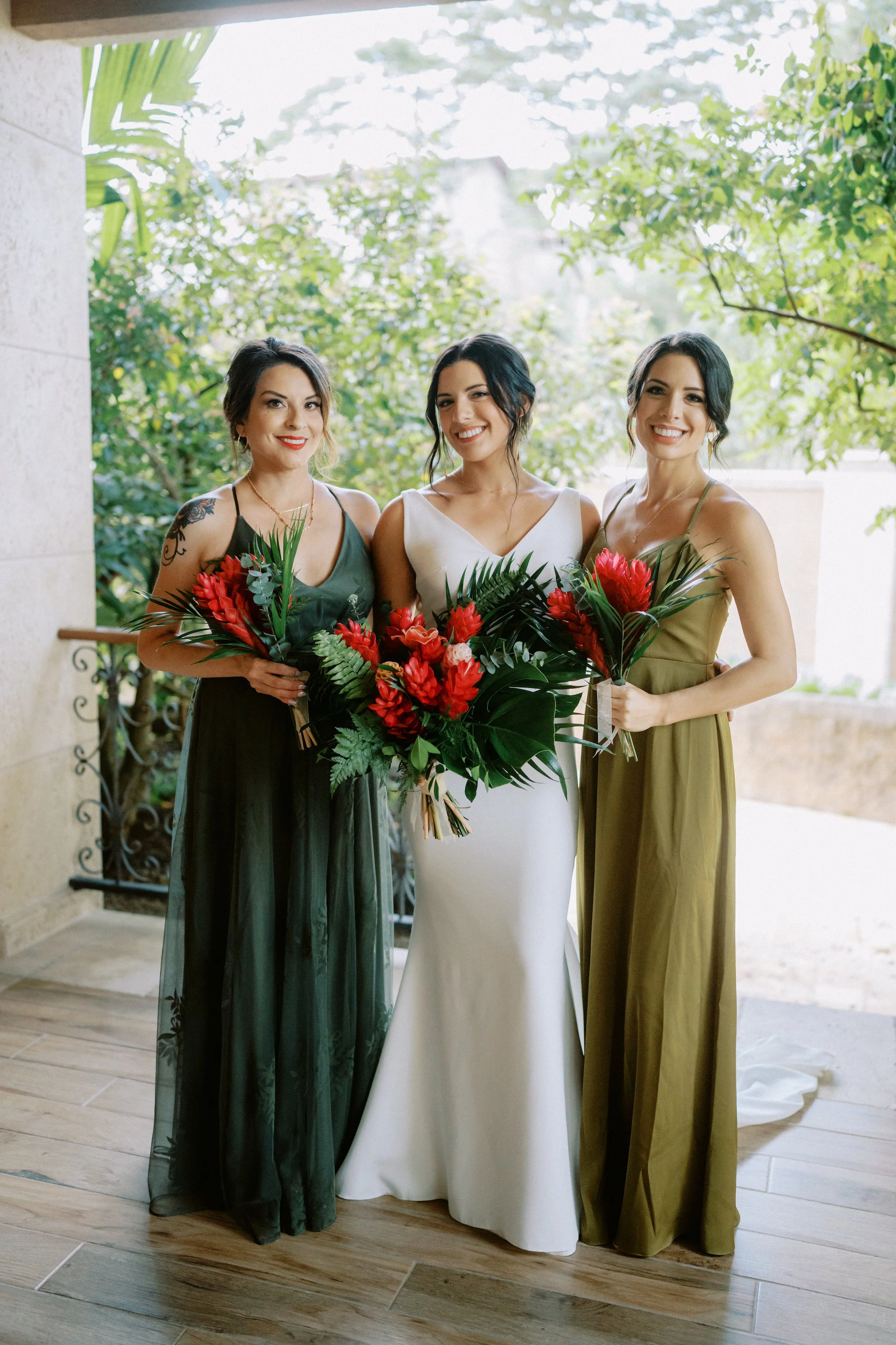 Breathtaking Arenal Volcano wedding with guests enjoying the serene river setting.