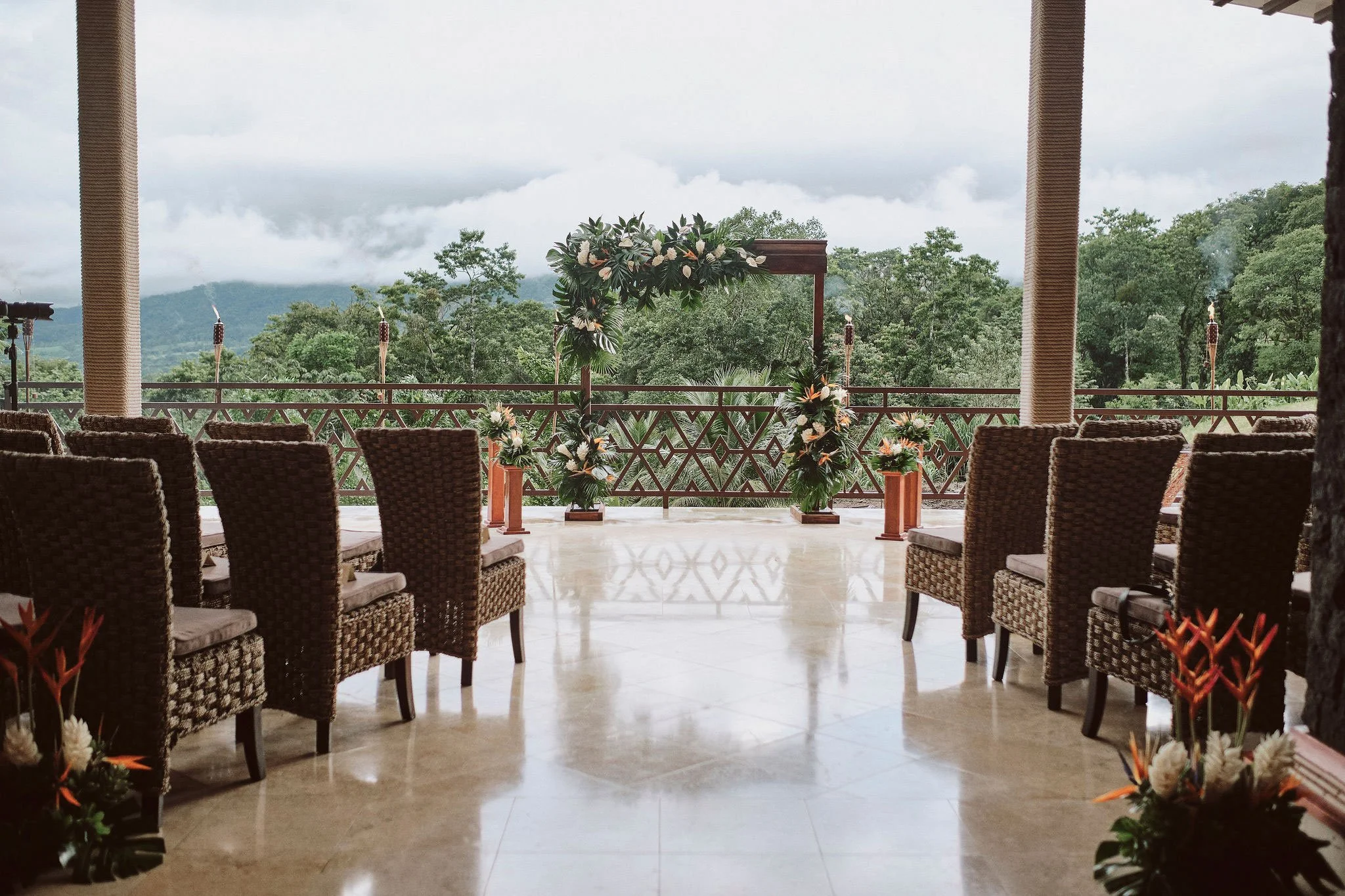 Whimsical romance wedding with pastel tones and tropical details over the Arenal Volcano