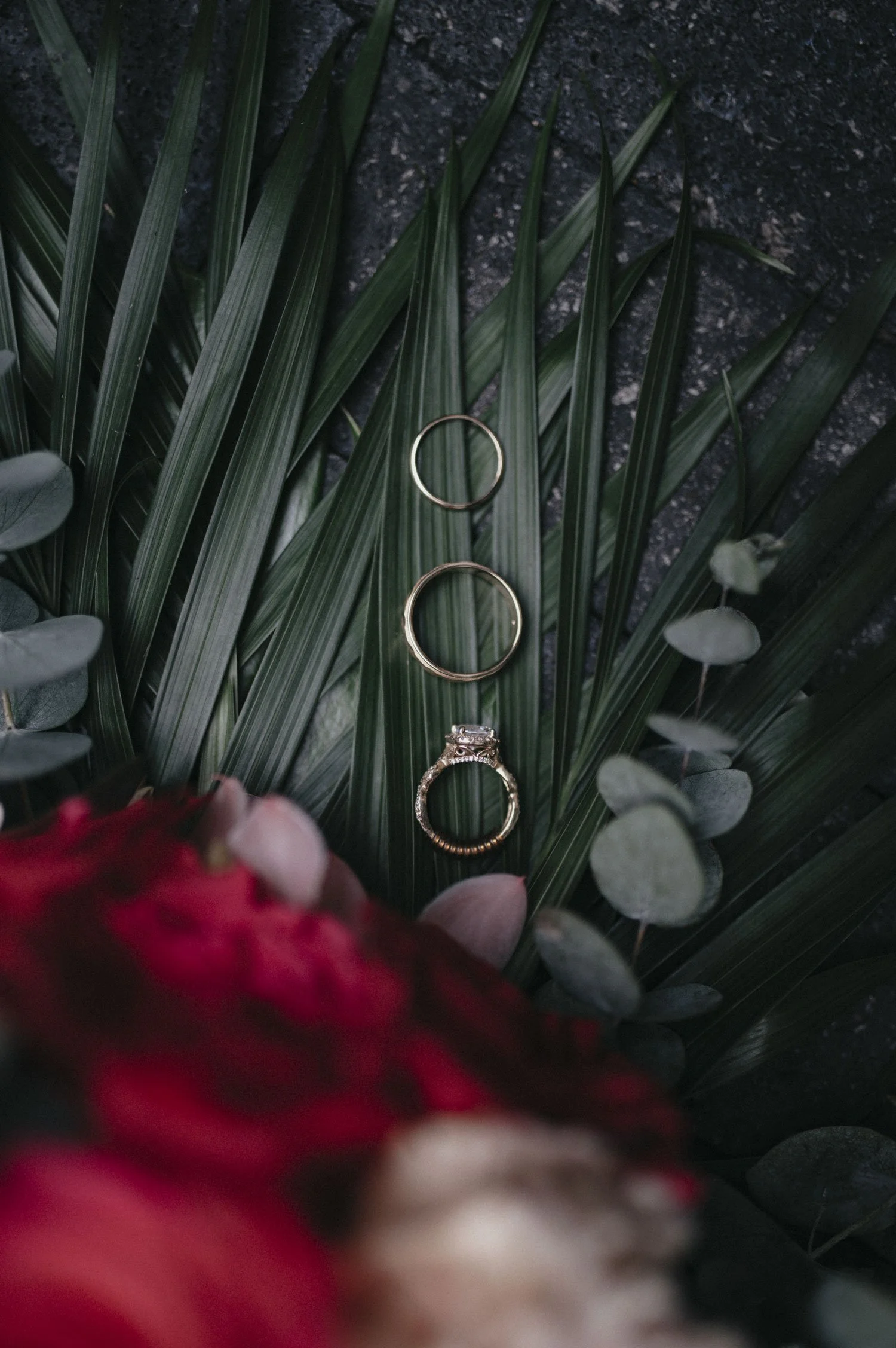Exotic rainforest bridal bouquet with vibrant tropical flowers.