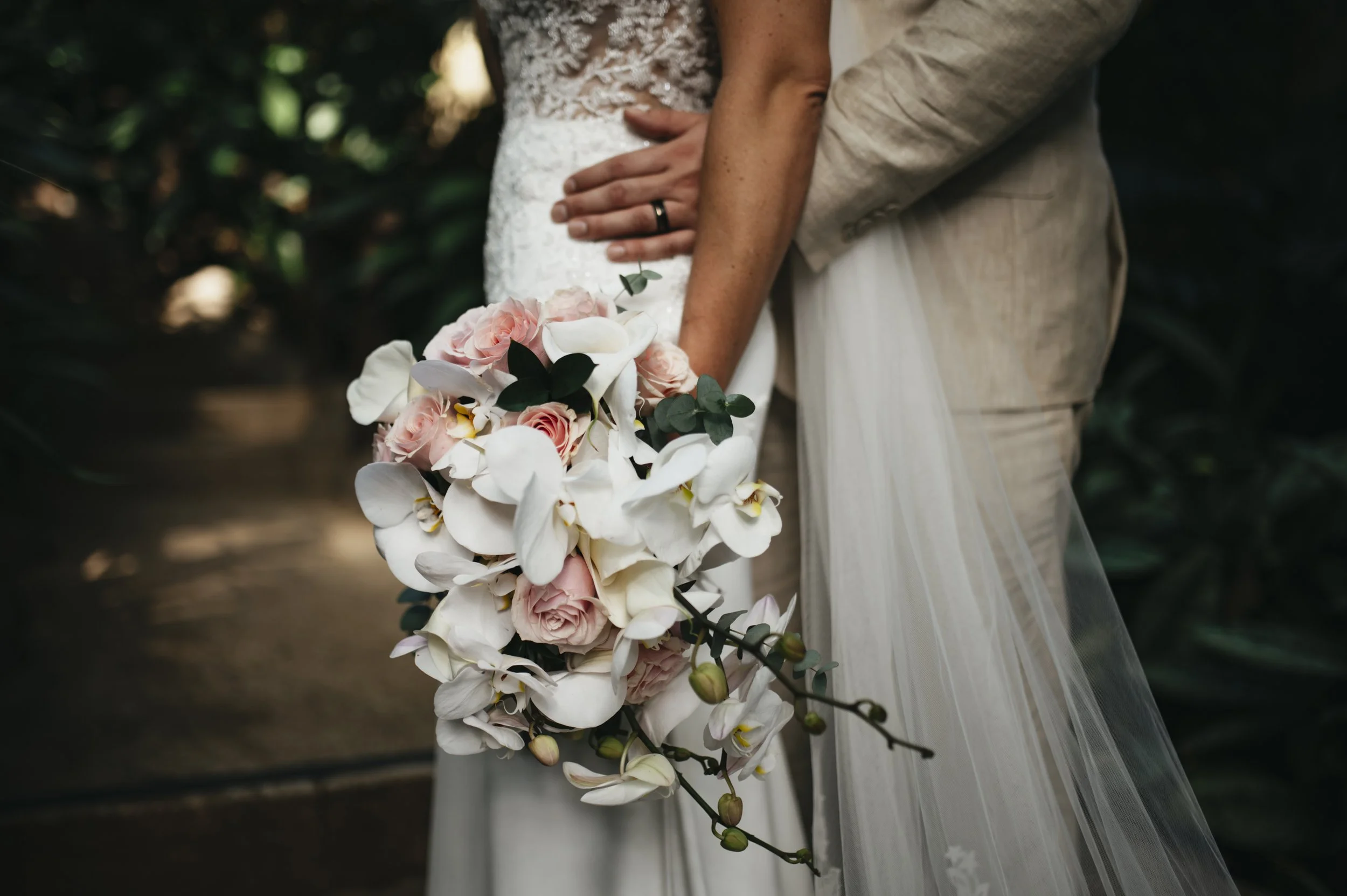 Enchanting pastel wedding with whimsical floral elements and pastel tropical flowers